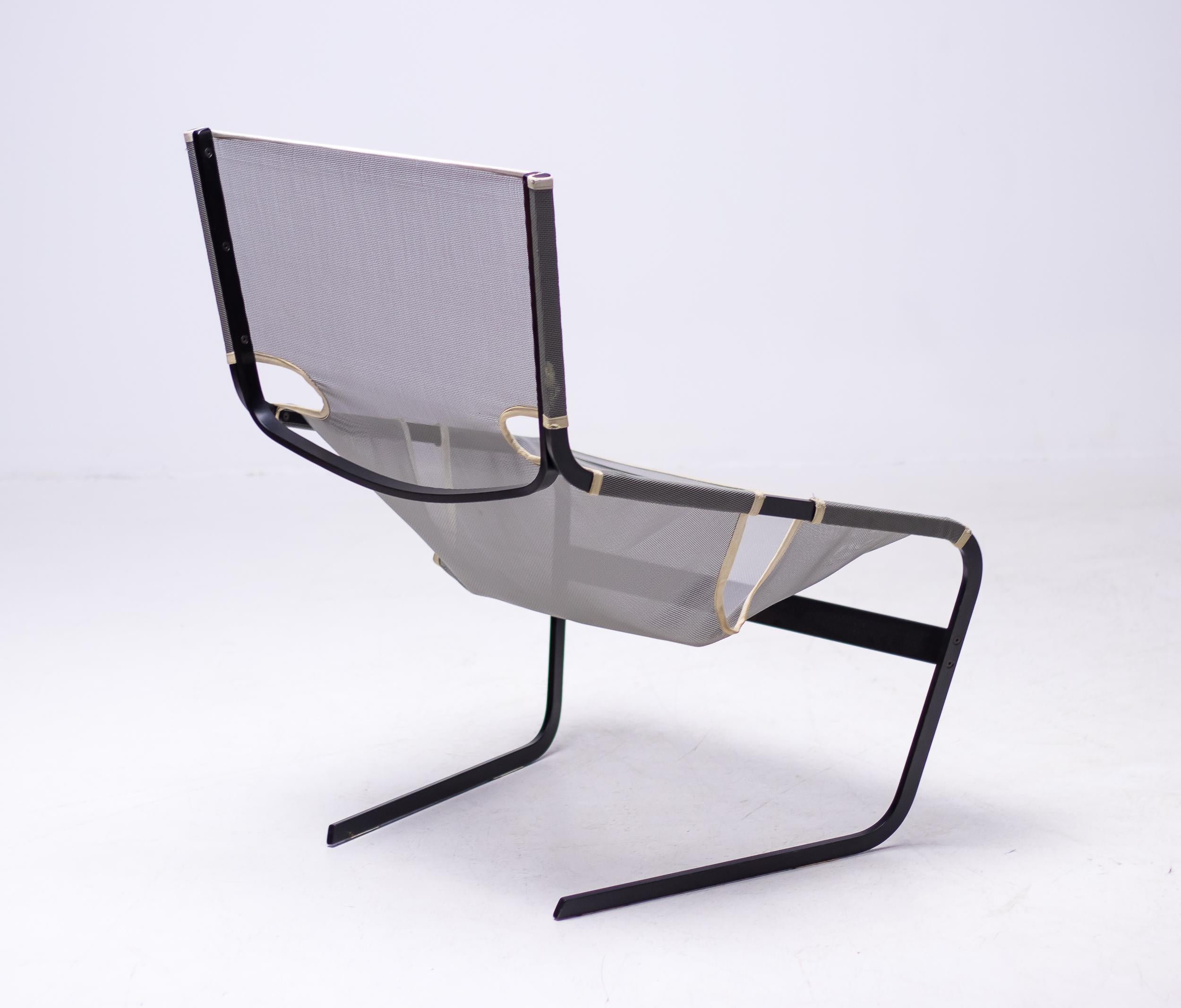 Easy chair by Pierre Paulin, metal and mesh, F444, the Netherlands, circa 1965.  This mesh F-444 chair is designed by Pierre Paulin for Artifort in 1962. This chair shows sharp lines and features an angled open frame that provides a floating seat.