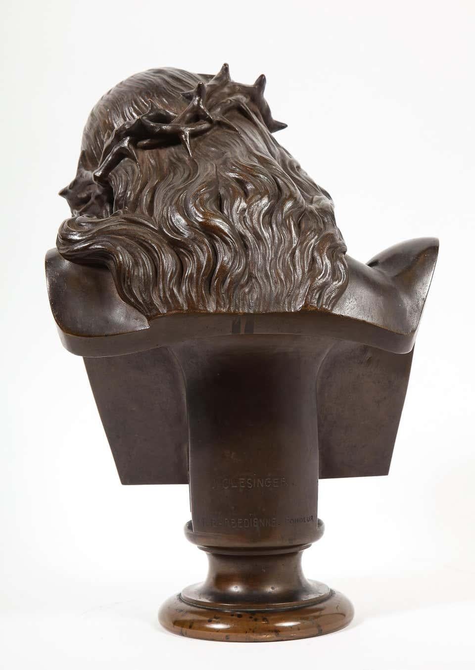 An exceptional French patinated realistic bronze bust of Jesus Christ, circa 1858  

Signed: J CLESINGER. & F. BARBEDIENNE FONDEUR, with the Reduction Mecanique seal.  

Measures: 12.5