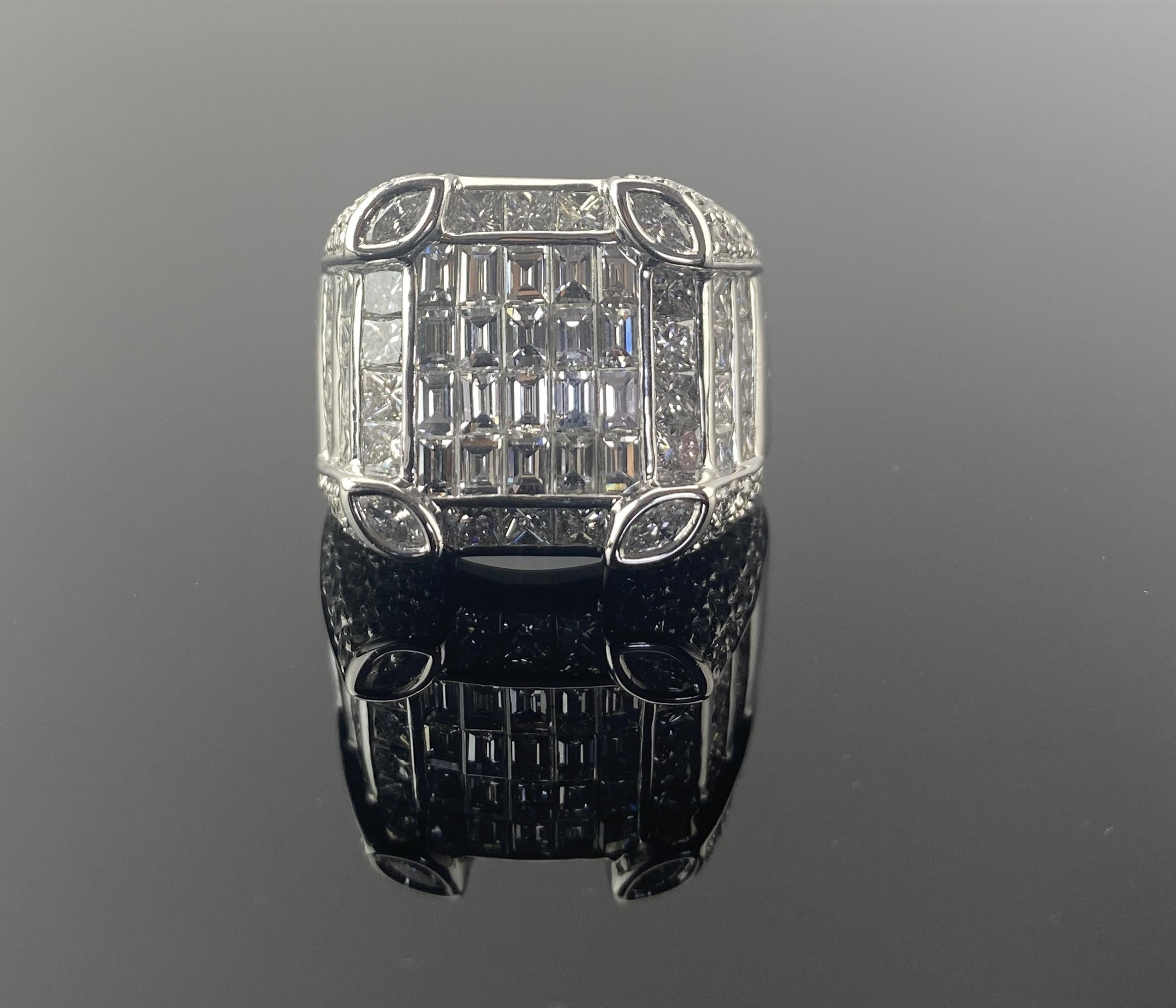 Crafted in 18K white gold ( 33.82 grams ), this one-of-a-kind piece features 7.49 carats of hand-set diamonds, including baguette and princess cuts that create a mosaic of brilliance . 

With a total weight of 35.32 grams , this ring is not only a