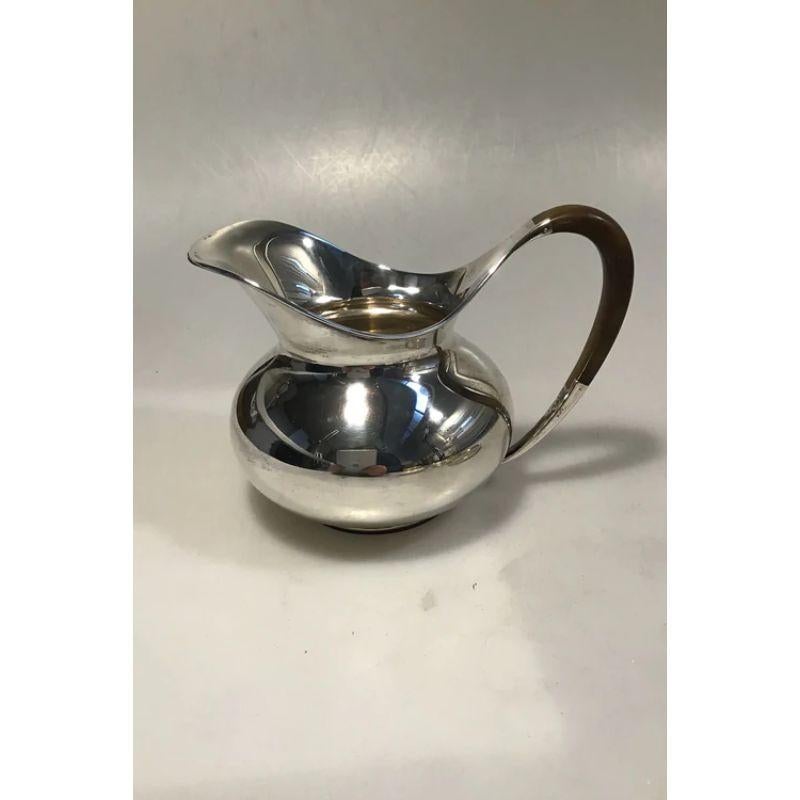 F. Hingelberg sterling silver pitcher

Measures H 12 cm (4.72 inch) Weight 365.3 gr / 12.89 oz

NB Engraving.