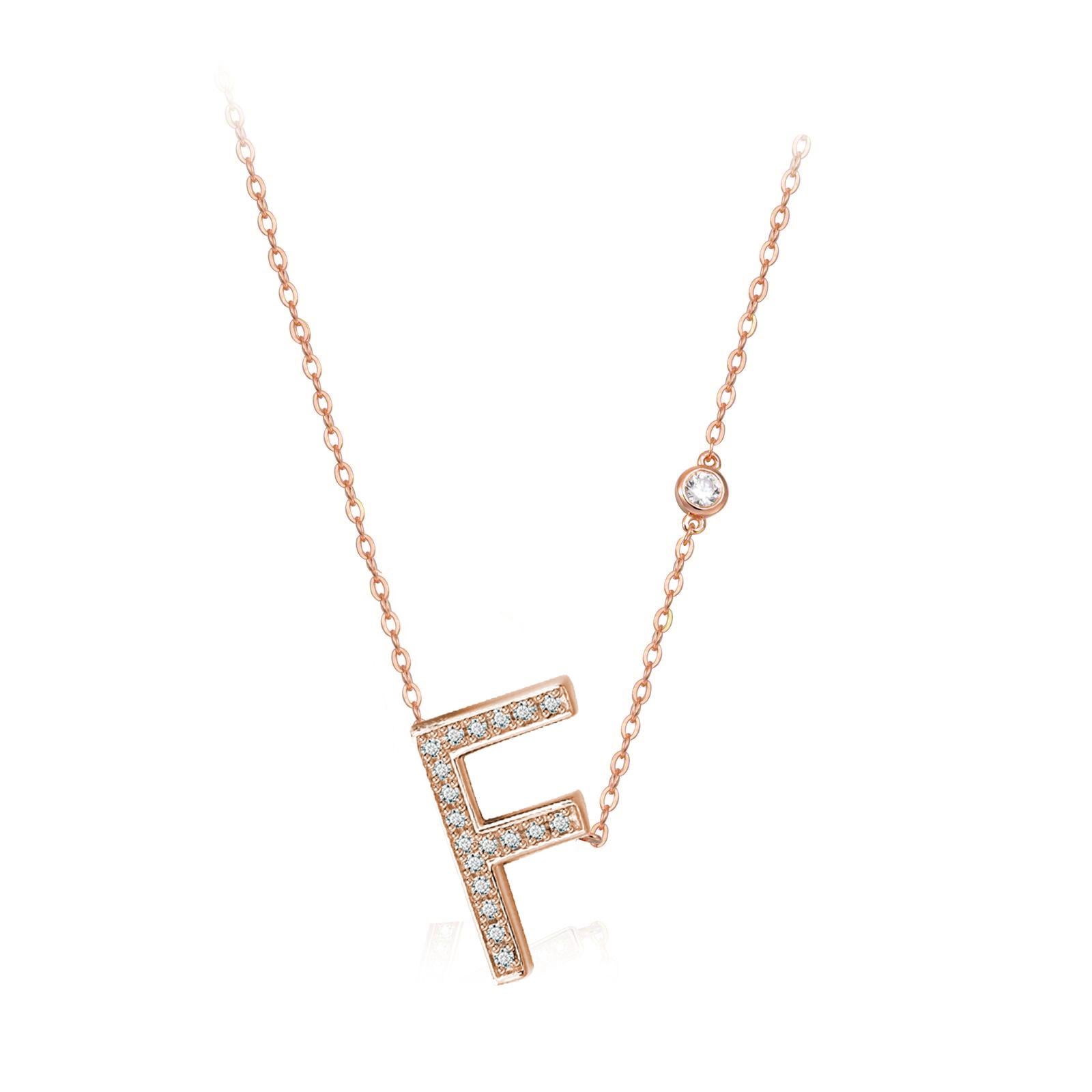 Nothing says YOU more than YOU. You are unique. You are bold. You're not afraid to share who you are. This initial bezel chain necklace is elegantly slimline while sharing a little bit about yourself with others. .925 sterling silver base also