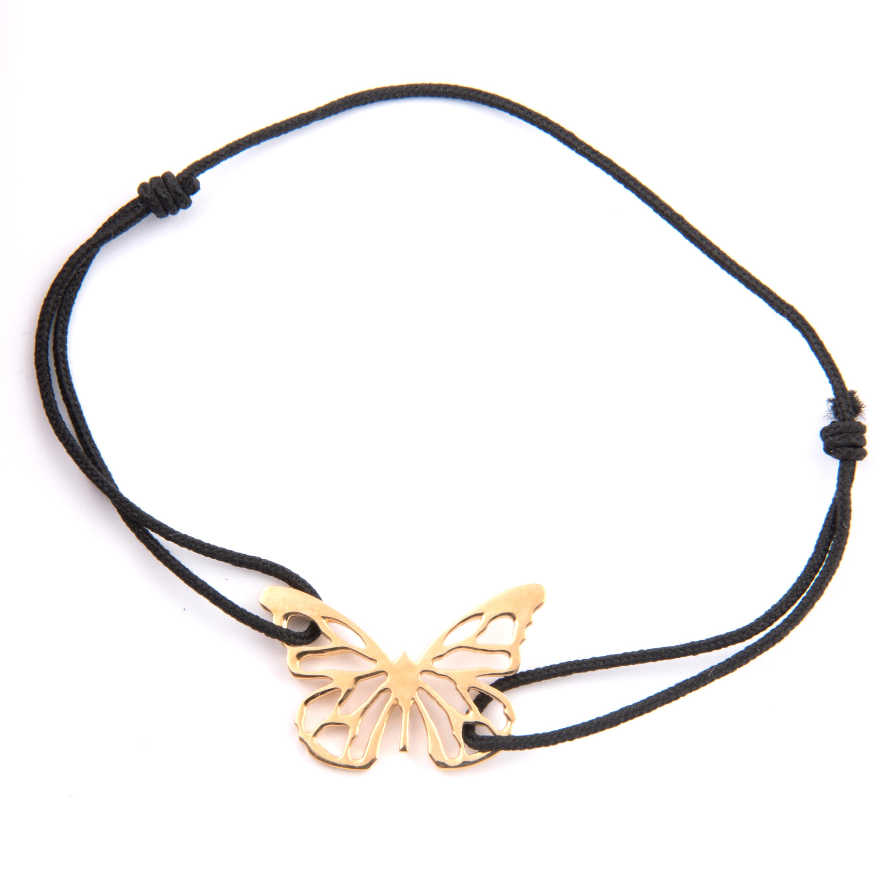 Bracelet designed by Florence Larochas, 18k yellow gold butterfly on an adjustable string, available in various colours
