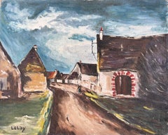 French Village Street with Stone Houses and Arched Doorway