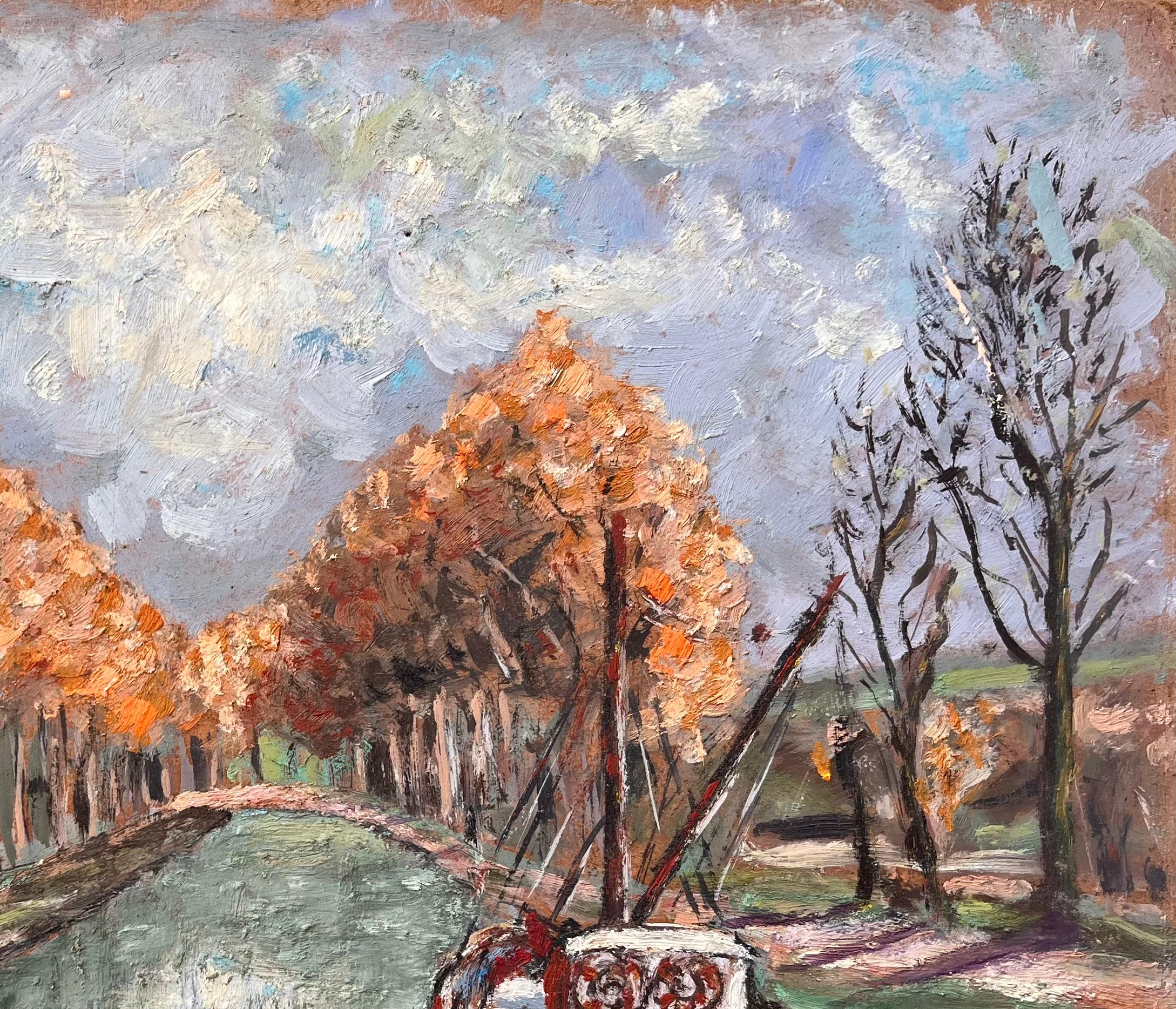 Title: Impressionist Autumn Canal Scene with Moored Boat and Tree Lined Path
By Le Lay
Signed: Yes
Size: 13 x 16.25 inches (height x width)
Oil painting on board, unframed
Condition: The painting is in good condition with minor signs of wear and