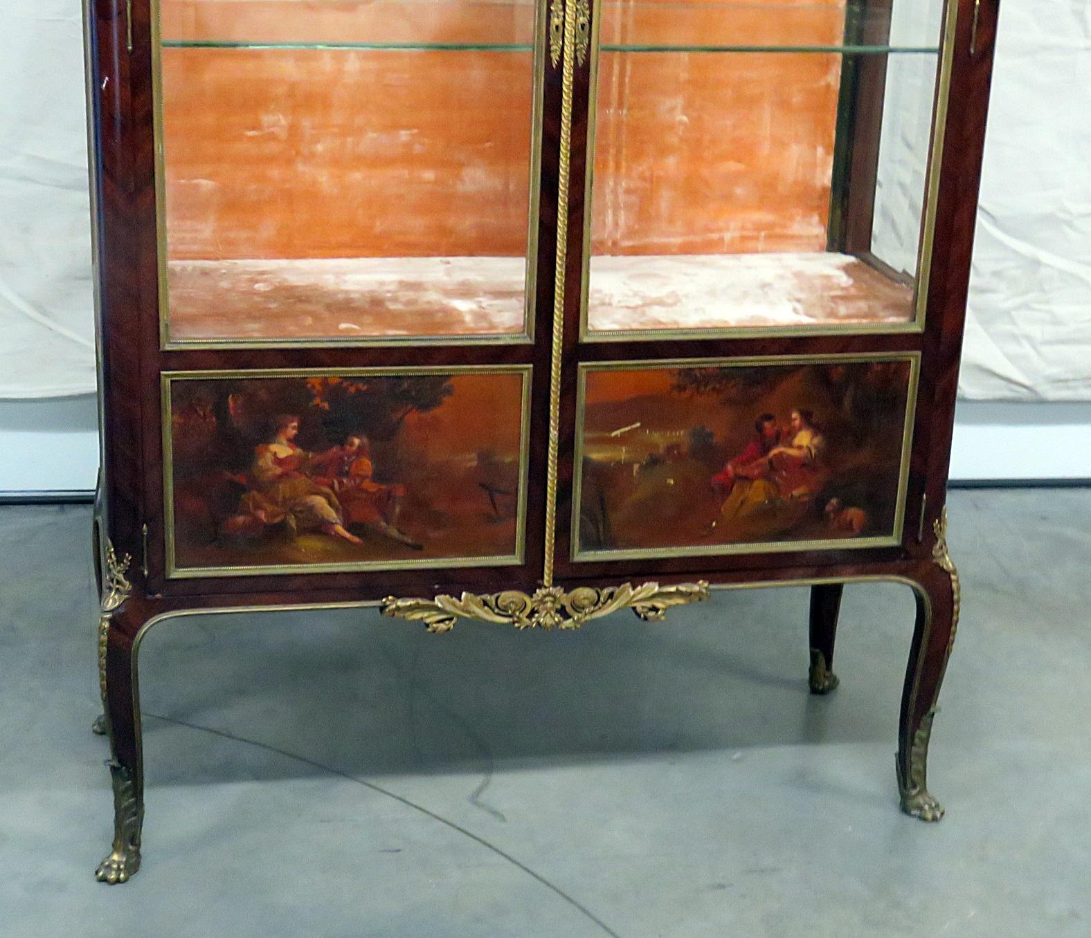 This is a superb Francois Linke Vitrine. This is not attributed, this is genuine. The rouge marble sits atop a stunning hand-painted Vernis Martin courtship scene and features the best possible bronze ormolu depicting puttis and various expertly