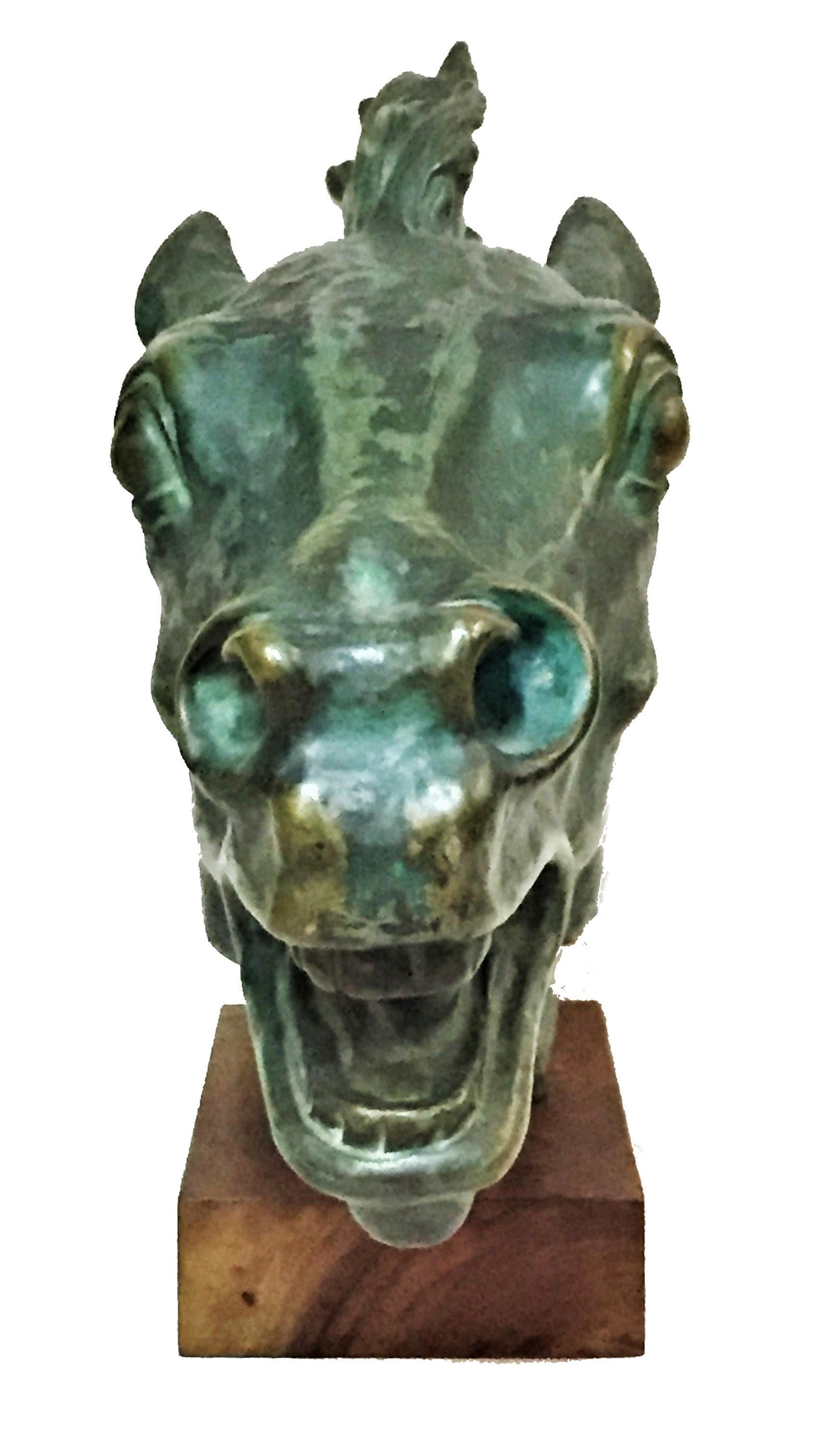 This is a vintage horse head sculpture by Italian designer F. Mortini is made of terracotta, painted to appear as patinated bronze.

Dimensions:
Height 18-3/4 inches 
Width 28-1/2 inches 
Depth 4-15/16 inches.
 