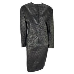 Gianni Versace, sfilata A/I 1986, set di gonne in pelle nera con ricami floreali