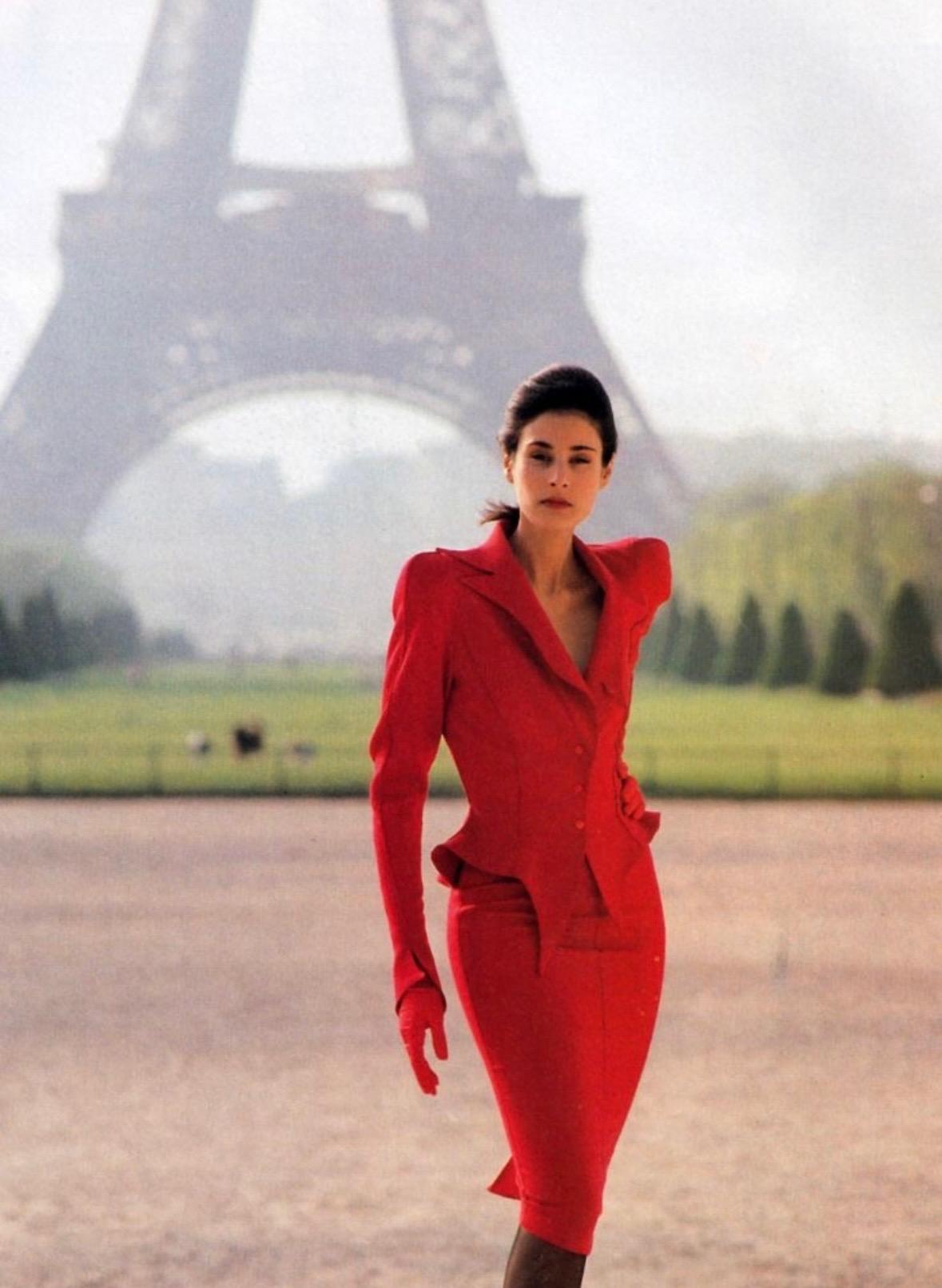 Presenting  a stunning red Thierry Mugler skirt suit, designed by Manfred Mugler. From the Fall/Winter 1988 'Les Infernales' collection, a version of this fiery red 'Tailleur Vampire' skirt suit debuted on the season's runway and was displayed in