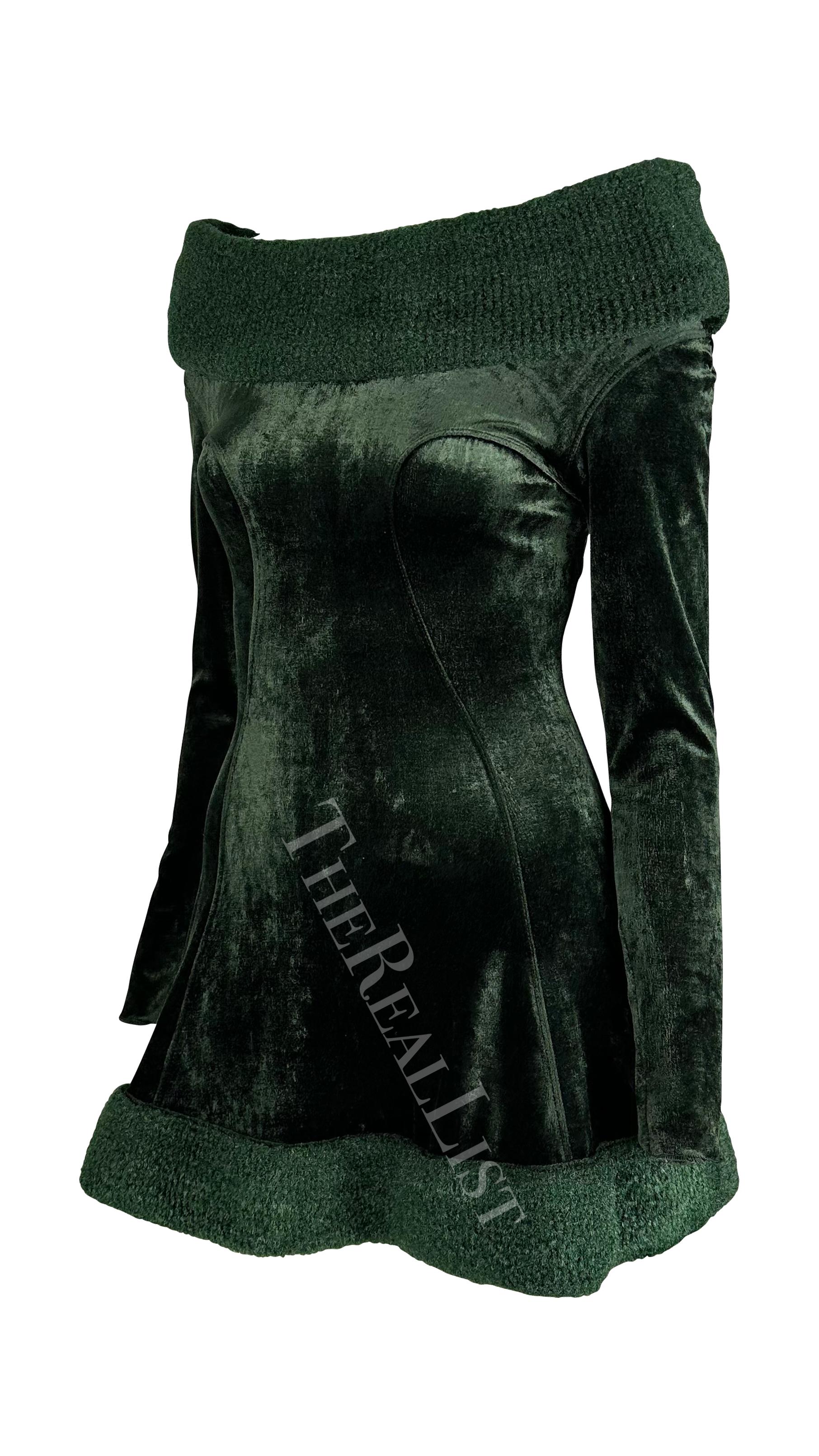 Presenting a fabulous dark green Alaia mini dress. From the Fall/Winter 1991 collection, this dress is constructed of rich deep green velvet. The form-fitting mini dress features long sleeves, a flare-cut skirt, and an off-the-shoulder neckline.