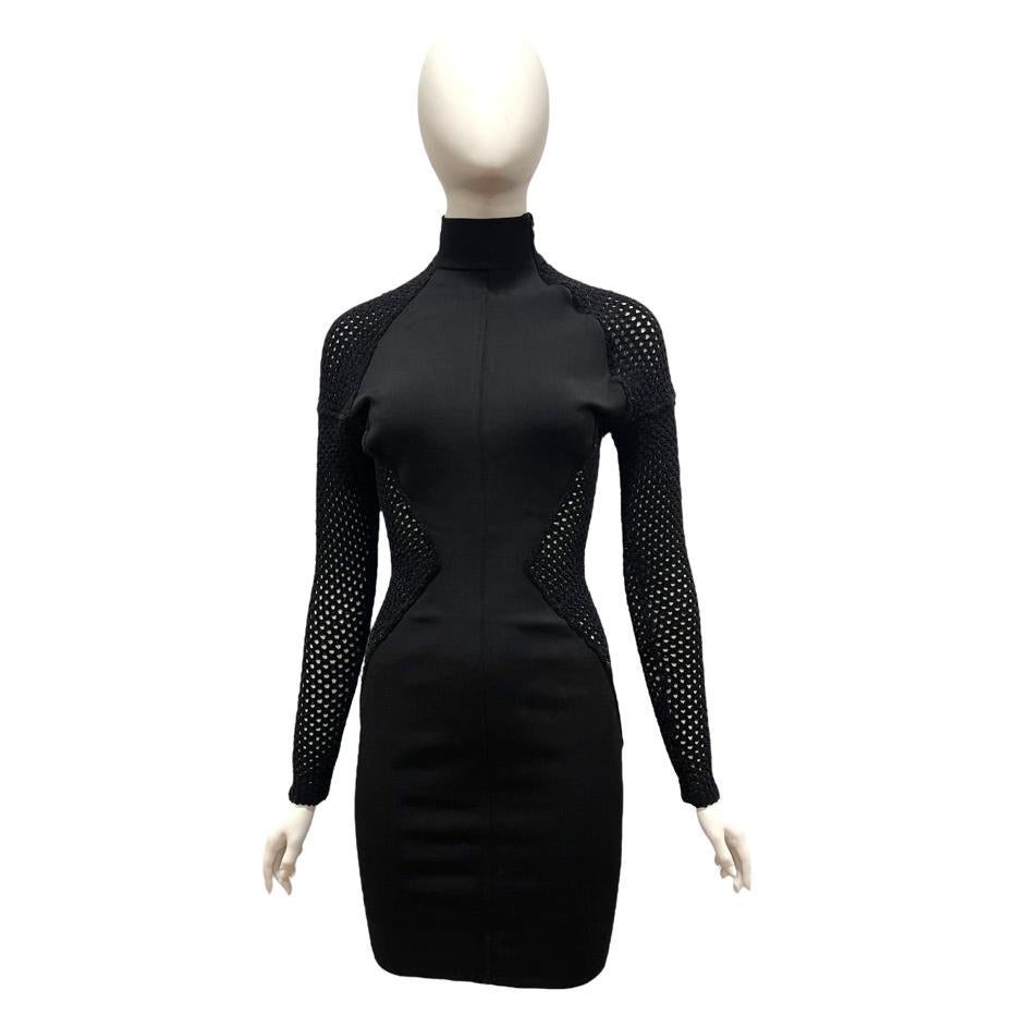 F/W 1991 Azzedine Alaia Stretch Dress with Sheer Sides
Long Sleeve knit
Condition: Excellent
Bust : 30.25
