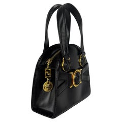 Vintage F/W 1992 Gianni Versace Bondage Strap Black Leather Medusa Mini Bag Crossbody