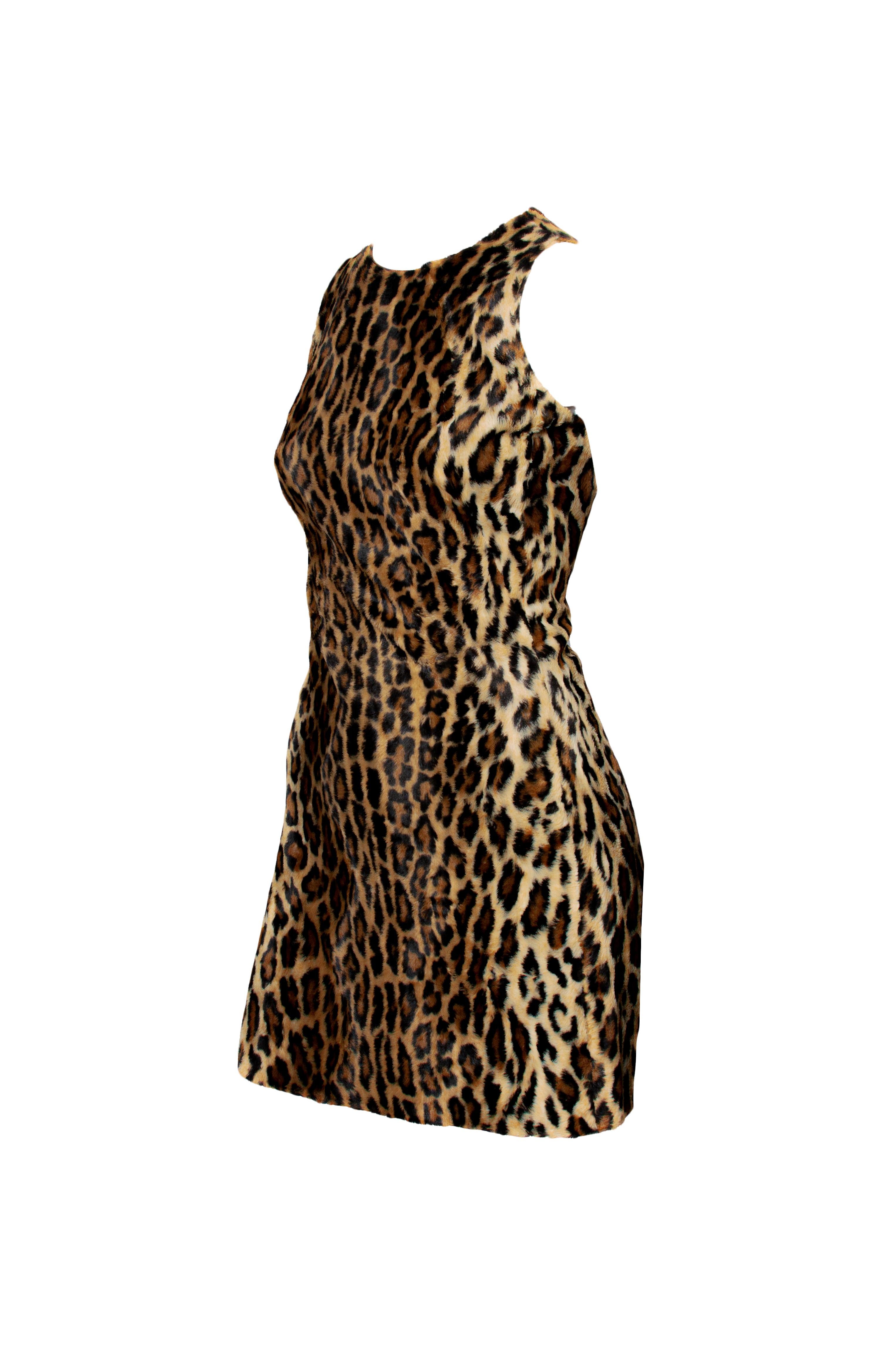 Presenting This dress was featured in the 1994 ad campaign and covered in a faux fur cheetah print. This faux cheetah pattern is also featured on the F/W 1994 runway. Constructed of cotton and viscose, this design by Gianni Versace is the perfect