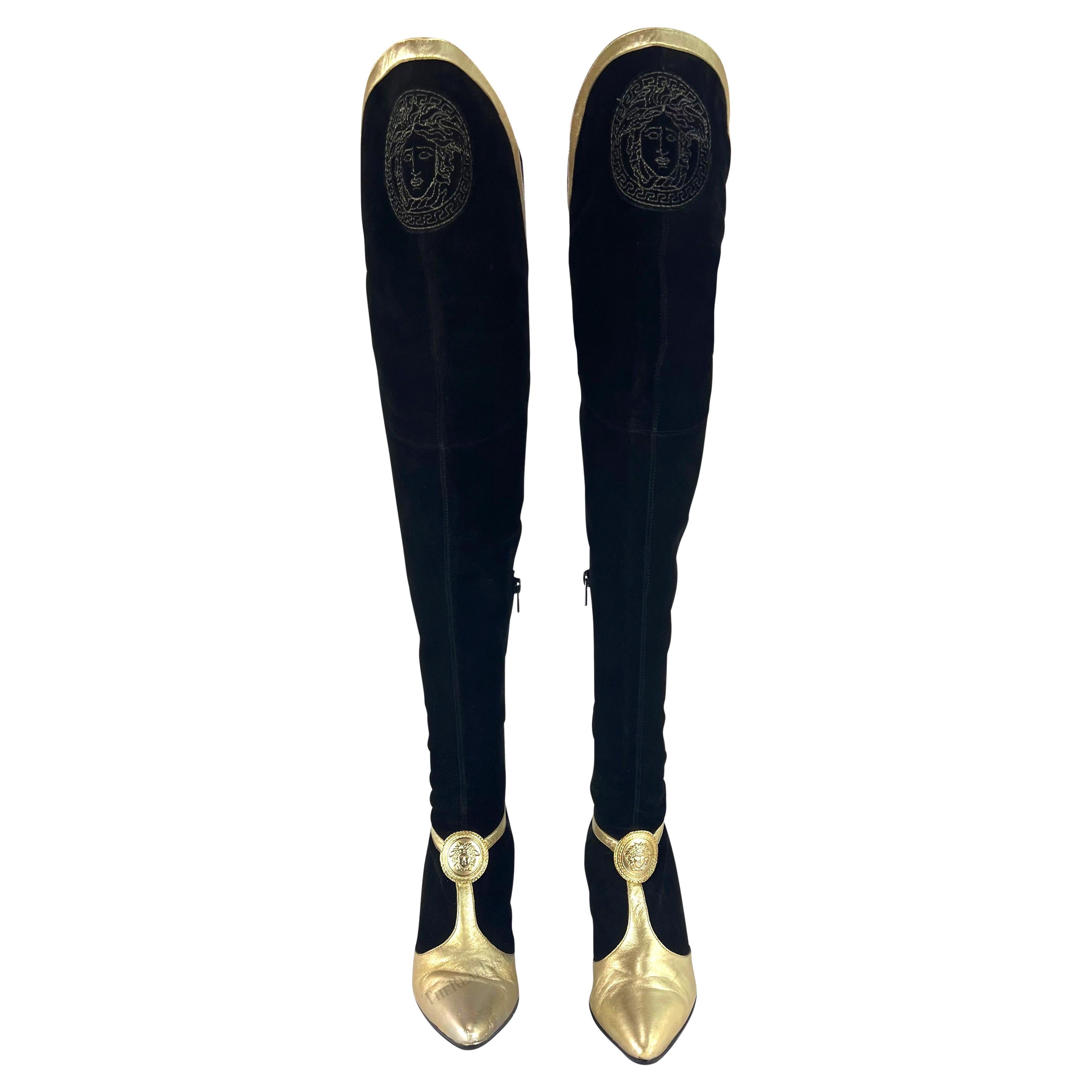 Which Versace designer made the pants-boots?