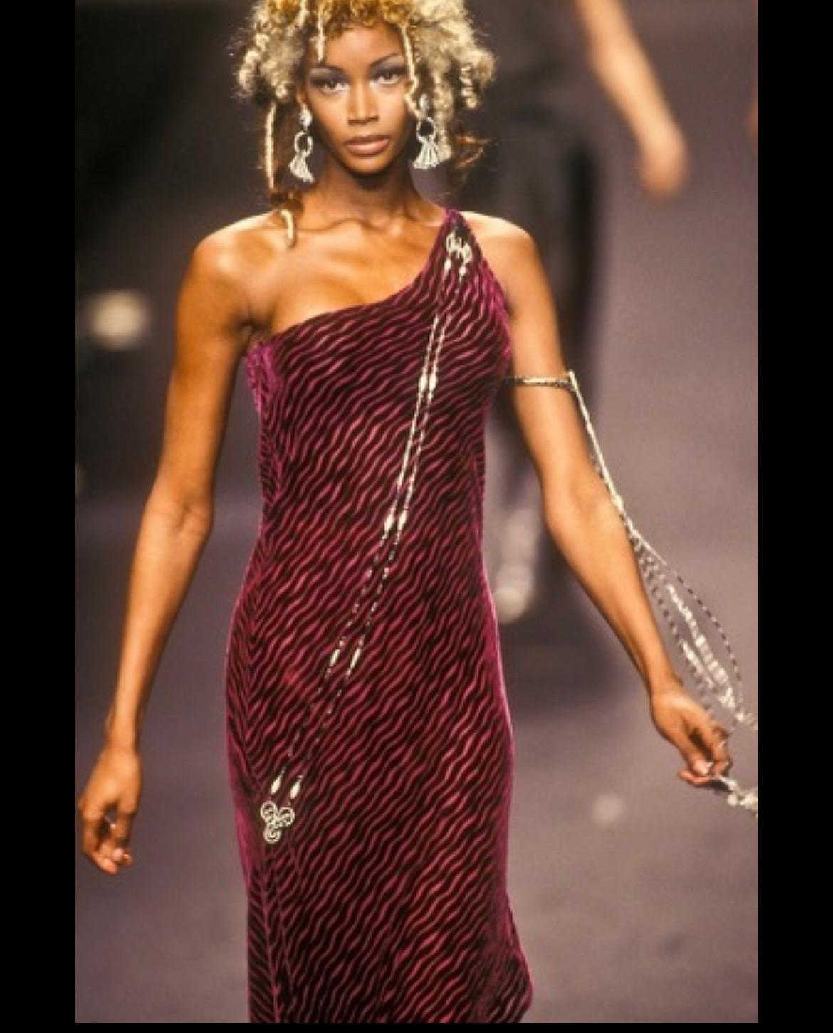 Presenting a fabulous brown velvet Karl Lagerfeld dress. From the Fall/Winter 1994 collection, the dress debuted on the season's runway in a pink and black variation with the same abstract velvet devoré pattern atop a light chiffon base. This dress