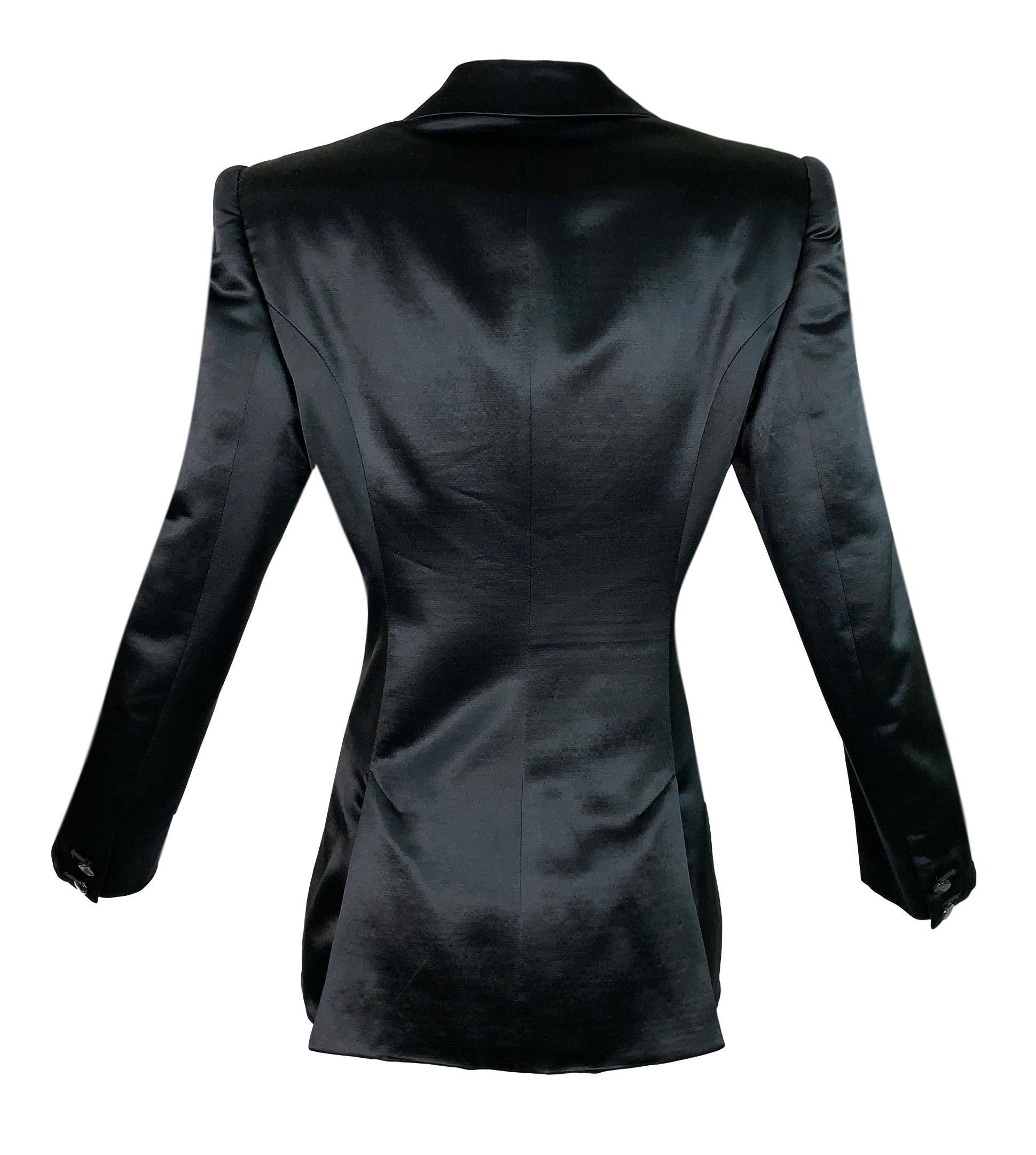 DESIGNER: F/W 1995 Gucci by Tom Ford

Please contact for more information and/or photos.

CONDITION: Good- no flaws

FABRIC: Wool & Silk

COUNTRY MADE: Italy

SIZE: 42

MEASUREMENTS; provided as a courtesy only- not a guarantee of fit: 

Chest: 36