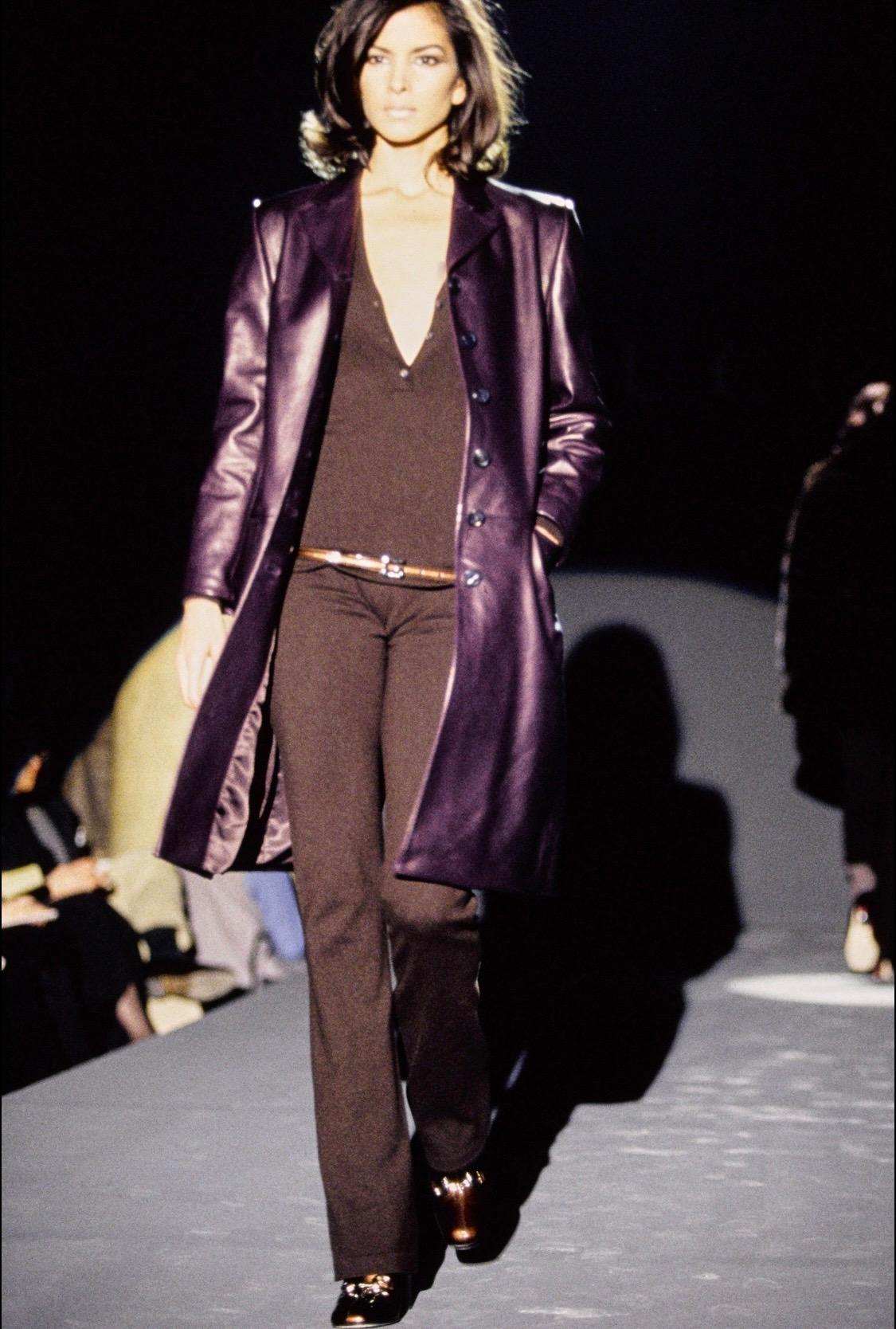 Presenting a stunning purple leather Gucci top, designed by Tom Ford. From the Fall/Winter 1995 collection, other matching purple leather garments debuted on the season's runway on look 40 as an overcoat and on look 41 as pants. This beautifully