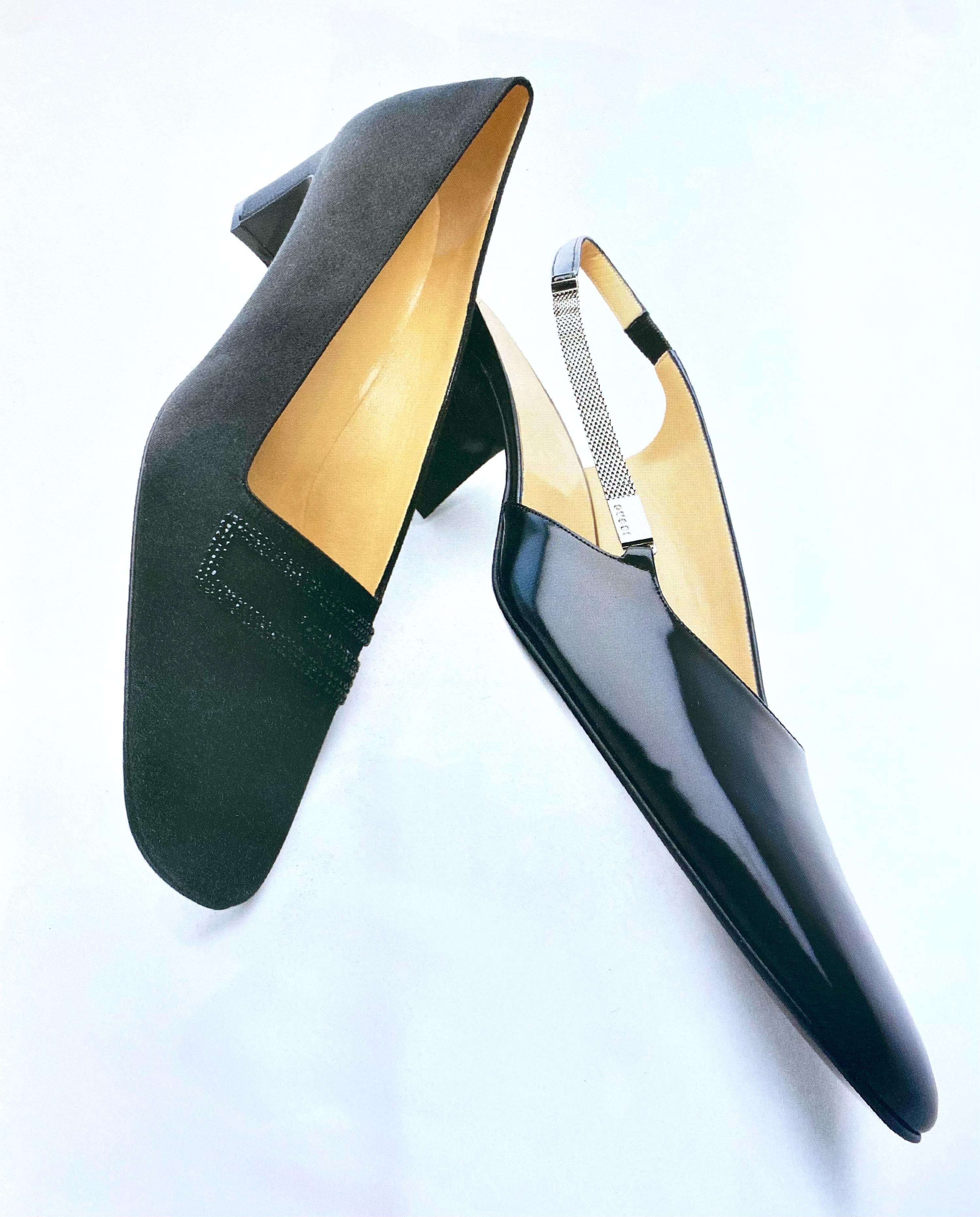 Presenting a black satin square 'G' Gucci beaded kitten heel, designed by Tom Ford. From the Fall/Winter 1996 collection, these classic heels are amped up with a subtle sparkling square 'G' at the vamp. Step into these rare late 1990s Gucci by Tom