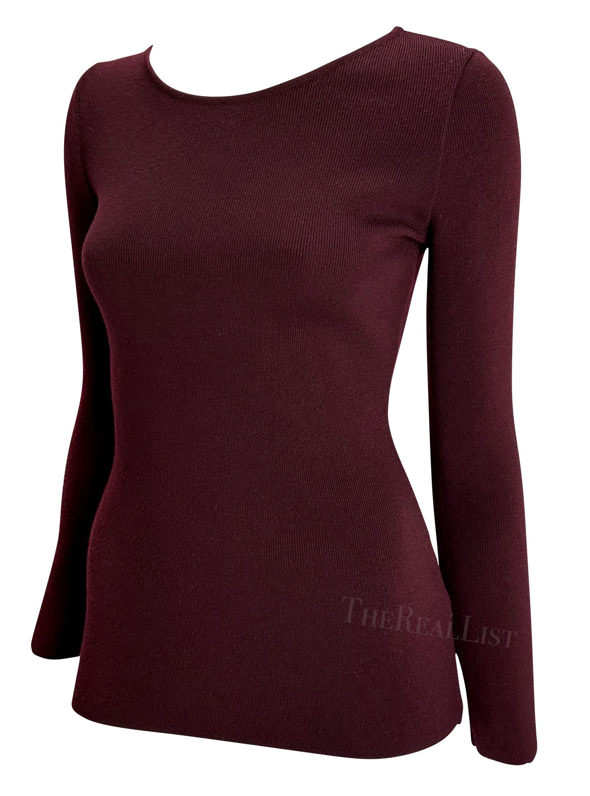 Presenting a beautiful burgundy knit Gucci sweater, designed by Tom Ford. From the Fall/Winter 1996 collection, this sweater features a wide crew neckline and is the perfect Gucci by Tom Ford staple.

Approximate measurements:
Size - Small
32