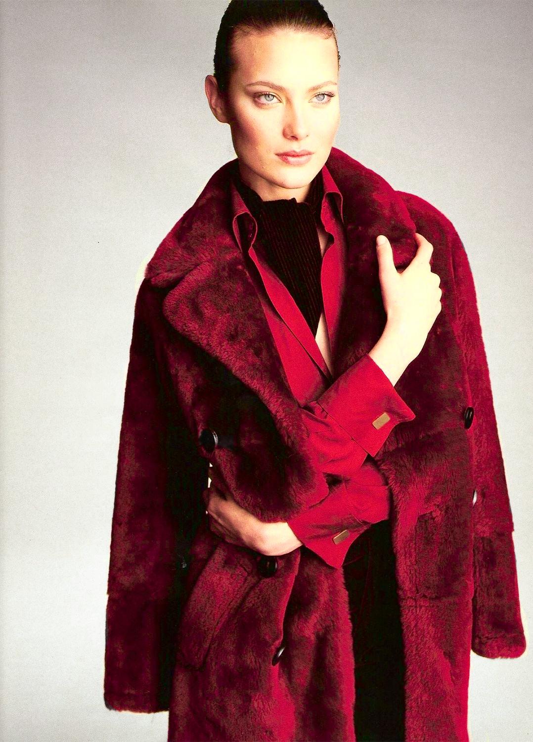 Presenting an incredible red-shearling Gucci double-breasted coat designed by Tom Ford. From the Fall/Winter 1996 collection, a similar full-length coat debuted on the season’s runway as part of Look 42, modeled by Kirsten Owen. It was also captured