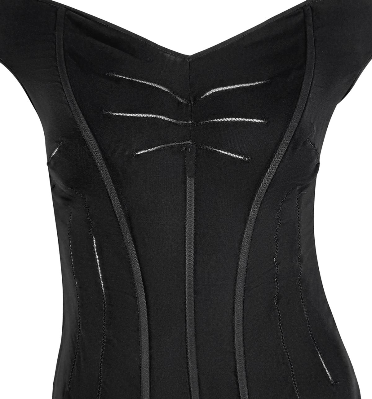 Cette robe du soir Dolce & Gabbana automne/hiver 1997 présente un corsage à l'ossature corsetée avec des coutures contrariées qui mettent en valeur la silhouette. Une superposition noire transparente se prolonge par une jupe longue, révélant un slip