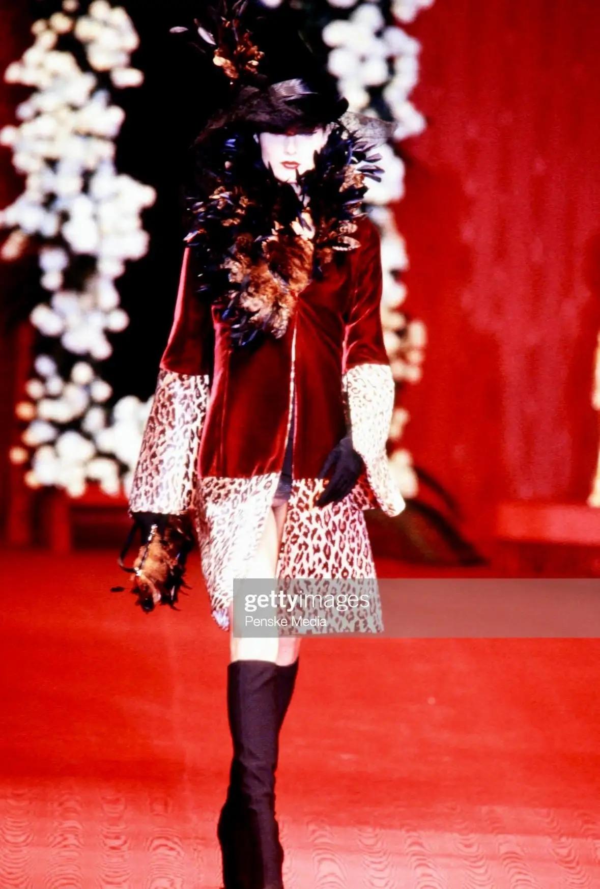 This black satin and brown feather evening bag from Dolce & Gabbana's Fall/Winter 1997 
