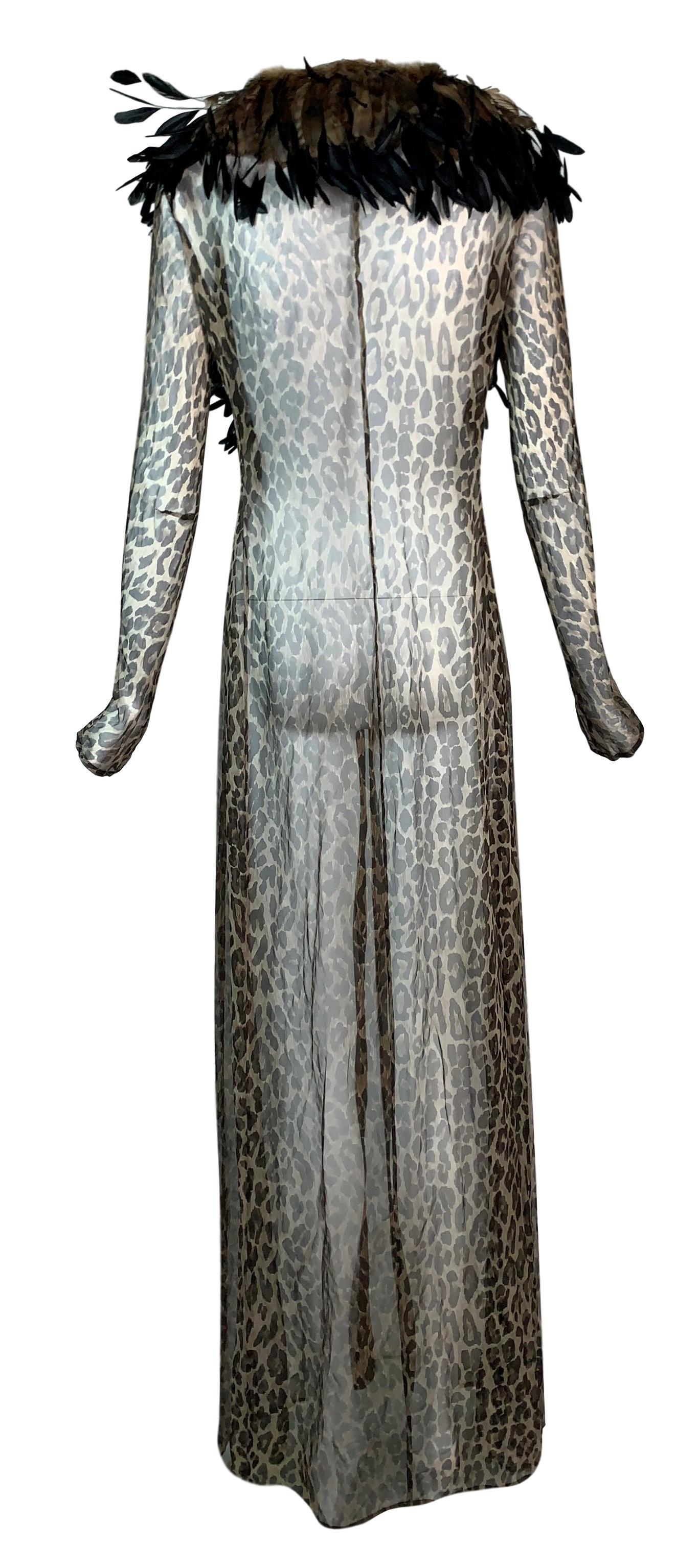 DESIGNER: F/W 1997 Dolce & Gabbana Runway

Please contact for more information and/or photos.

CONDITION: Good- no holes or stains

FABRIC: 100% silk w feathers

COUNTRY MADE: Italy

SIZE: 42

MEASUREMENTS; provided as a courtesy only- not a