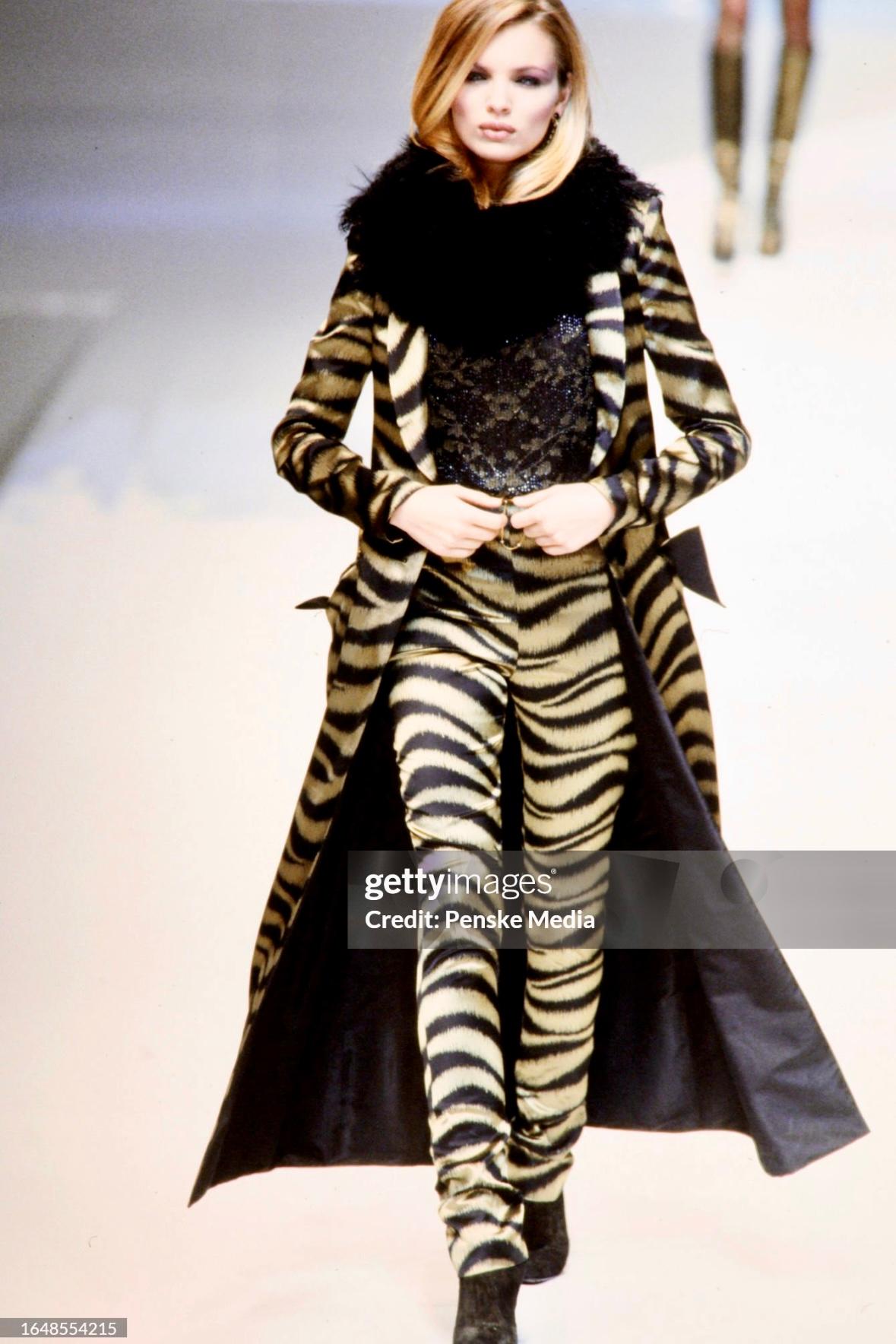 In celebration of Valentino's 30th anniversary, this full-length tiger stripe-length Valentino coat is an updated nod to the original Fall 1967 Haute Couture version. Similar to the original version, as worn by Veruschka in Vogue and captured by