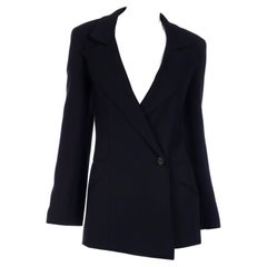 Chanel - Blazer vintage en laine noire avec bouton CC et doublure CC en soie, automne-hiver 1998