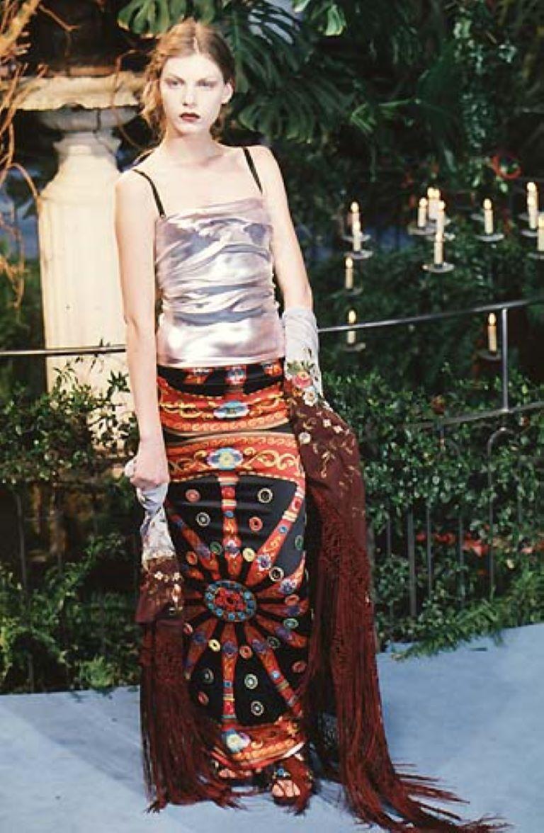 Dolce Gabbana
Ready-to-Wear - Runway Collection
Women
Fall / Winter 1998

F/W 1998 Dolce & Gabbana Printed Silk Maxi Skirt

size ~S-M

very good condition, on the black part of the skirt there are white stripes, like a little faded, they are not so