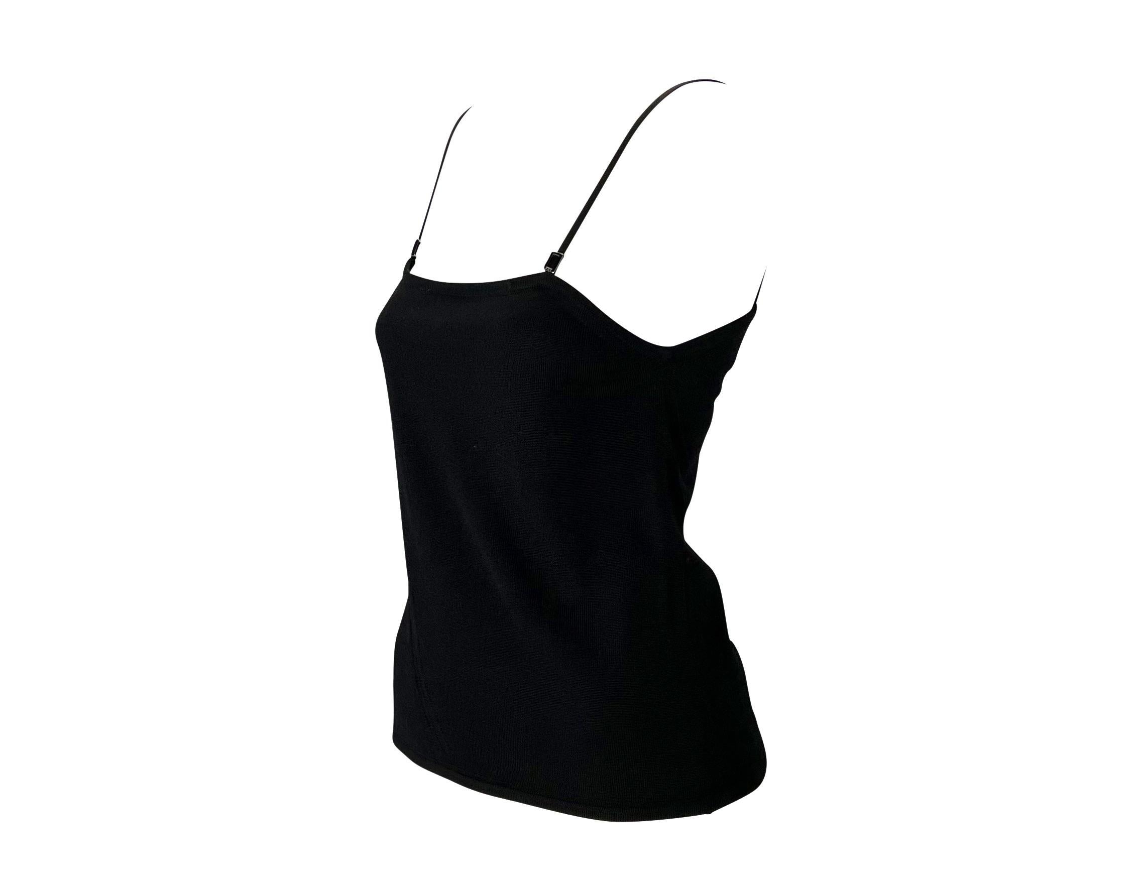 Presenting a black wool spaghetti strap Gucci tank top, designed by Tom Ford. From the Fall/Winter 1998 collection, this stunning tank top features a square neckline and moveable metal branded charms attached to the straps. Not your average tank