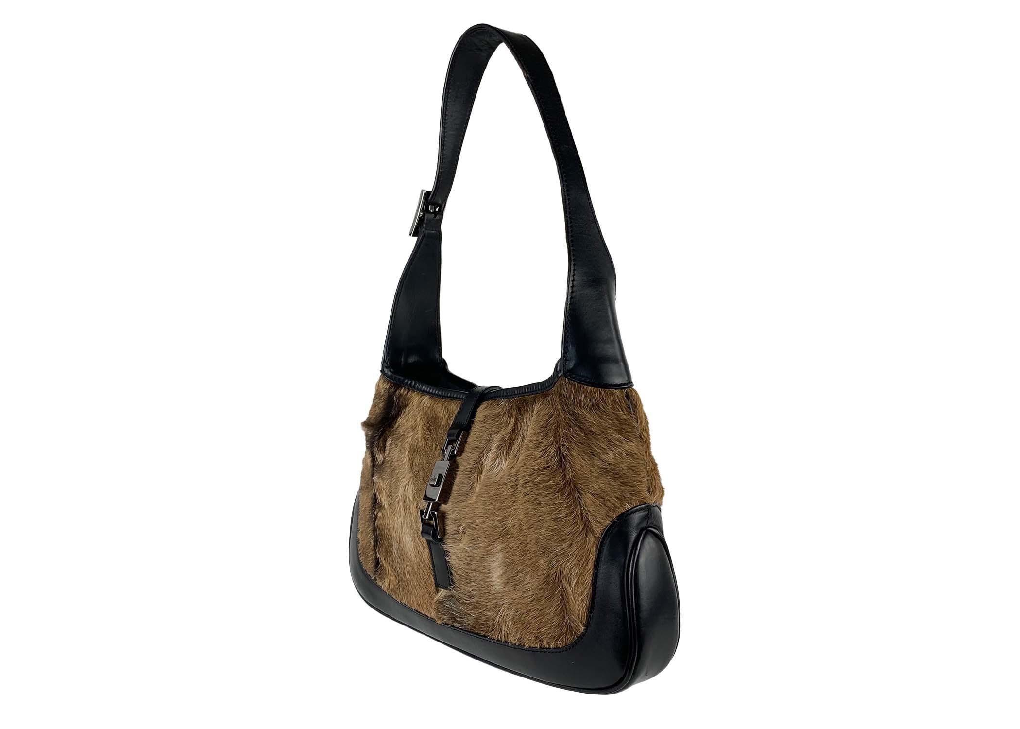 TheRealList presents: a medium-sized Jackie bag in soft, brown goat fur. This bag was designed for the F/W 1999 collection, which featured many other goat fur bags, shoes, and accessories. According to Ford, this collection was meant to be cleaner