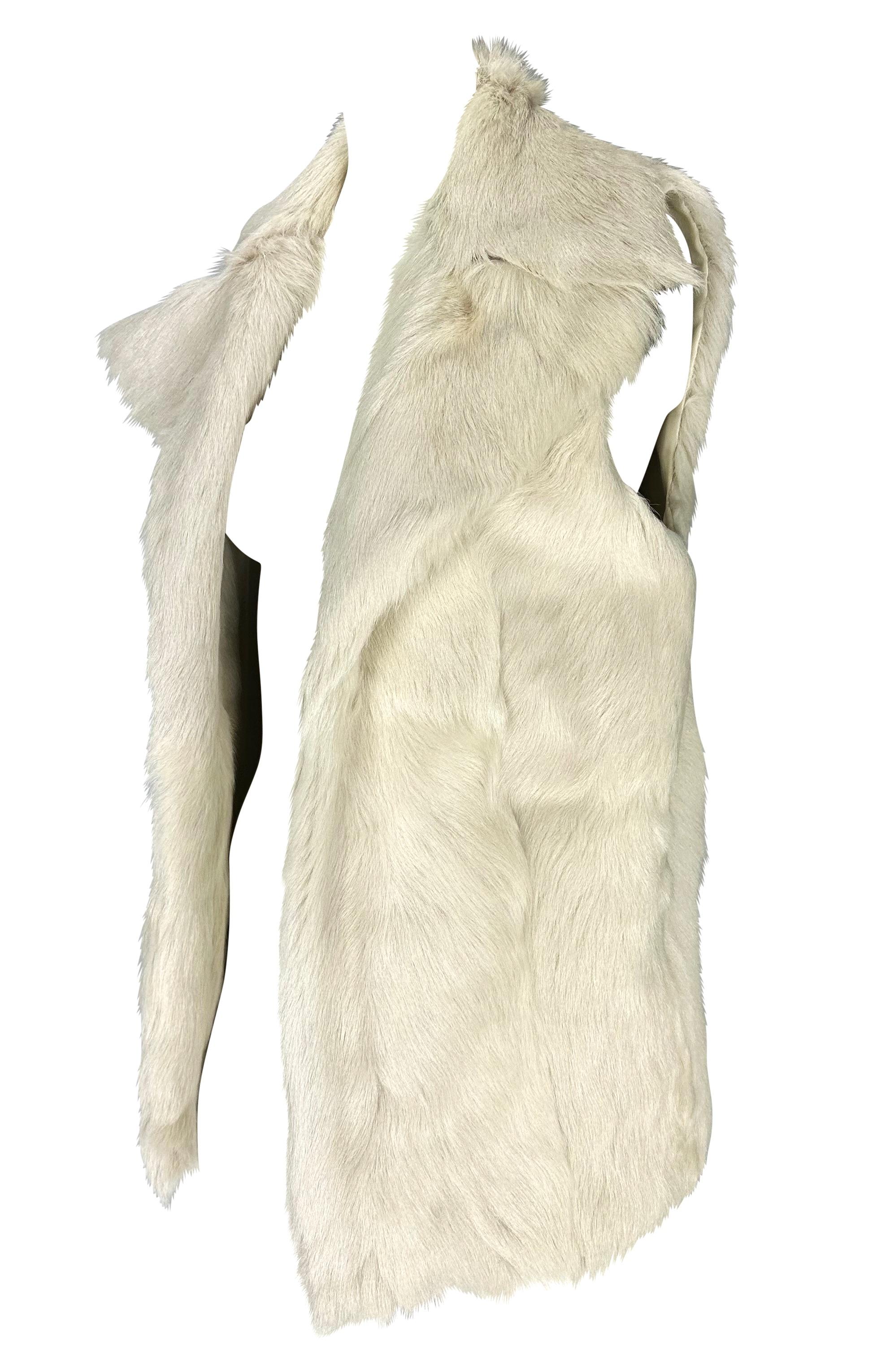 TheRealList presents: an incredible unisex/men's off-white goat fur Gucci vest, designed by Tom Ford. From the Fall/Winter 1999 collection, this rare sample piece never made it to production. The vest is constructed entirely of goat fur and features