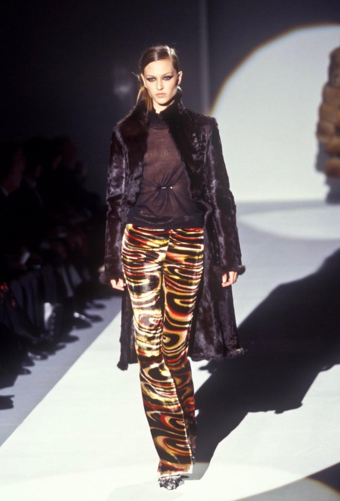 Presenting From the Gucci Fall/Winter 1999 collection designed by Tom Ford, this gorgeous lucite hoop, bucket bag features Tom Ford's memorable psychedelic pattern in silk velvet. The same pattern is seen on the runway on other pieces in this