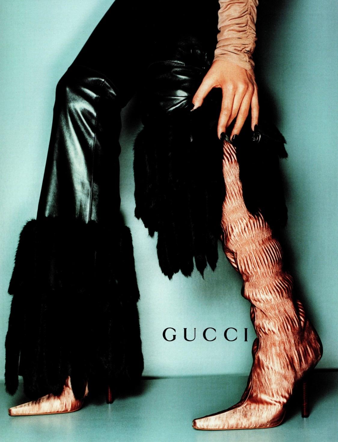 Presenting a rare pair of ruched silk high-heeled boots designed by Tom Ford for Gucci's Fall/Winter 1999 collection. According to Ford, this collection was meant to be cleaner than the previous season, which is remembered for its heavy use of