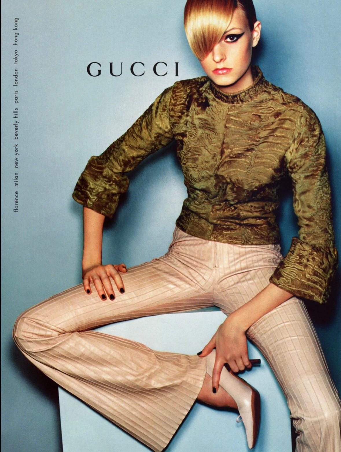 These Gucci by Tom Ford beige leather panel flare pants from the Fall/Winter 1999 collection were featured on the runway and further highlighted in the season's ad campaign, captured by Mario Testino. Styled with a chic leather texture and distinct