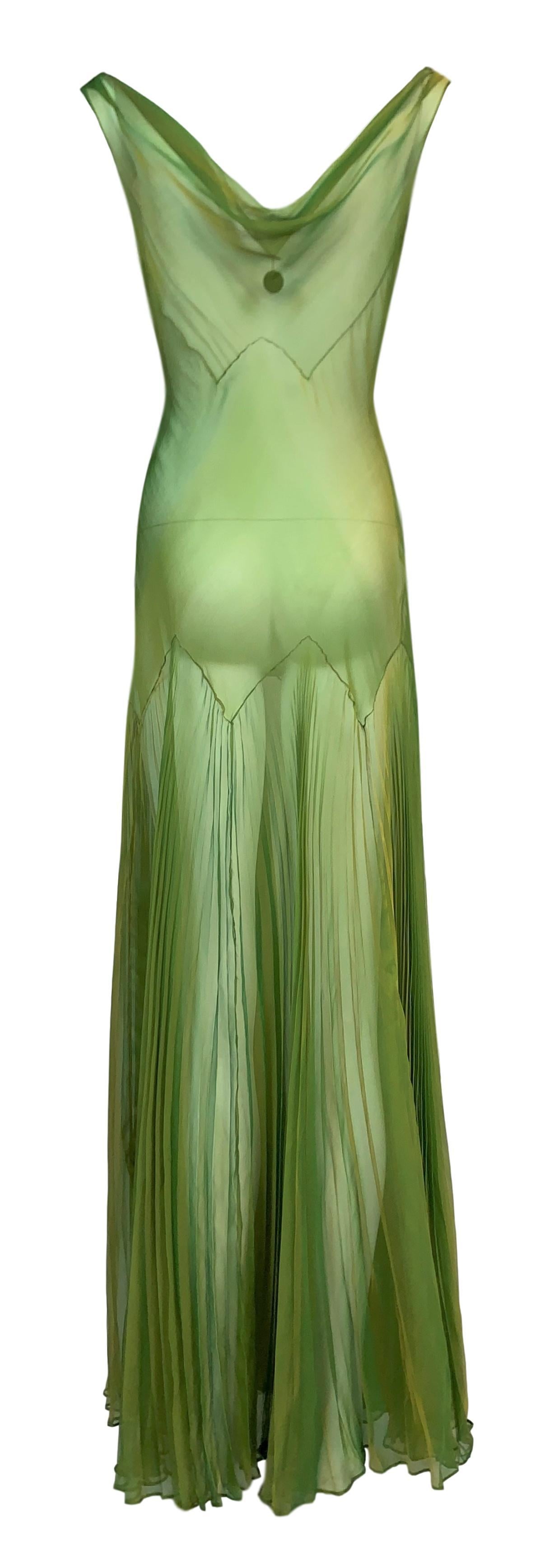 DESIGNER: F/W 1999 John Galliano
CONDITION: Good- 1 extremely faint mark- hidden in pleats- see last photo
MATERIAL: Tag removed but its silk
COUNTRY MADE: France
SIZE: Tag removed- see measurements
MEASUREMENTS; provided as a courtesy only- not a