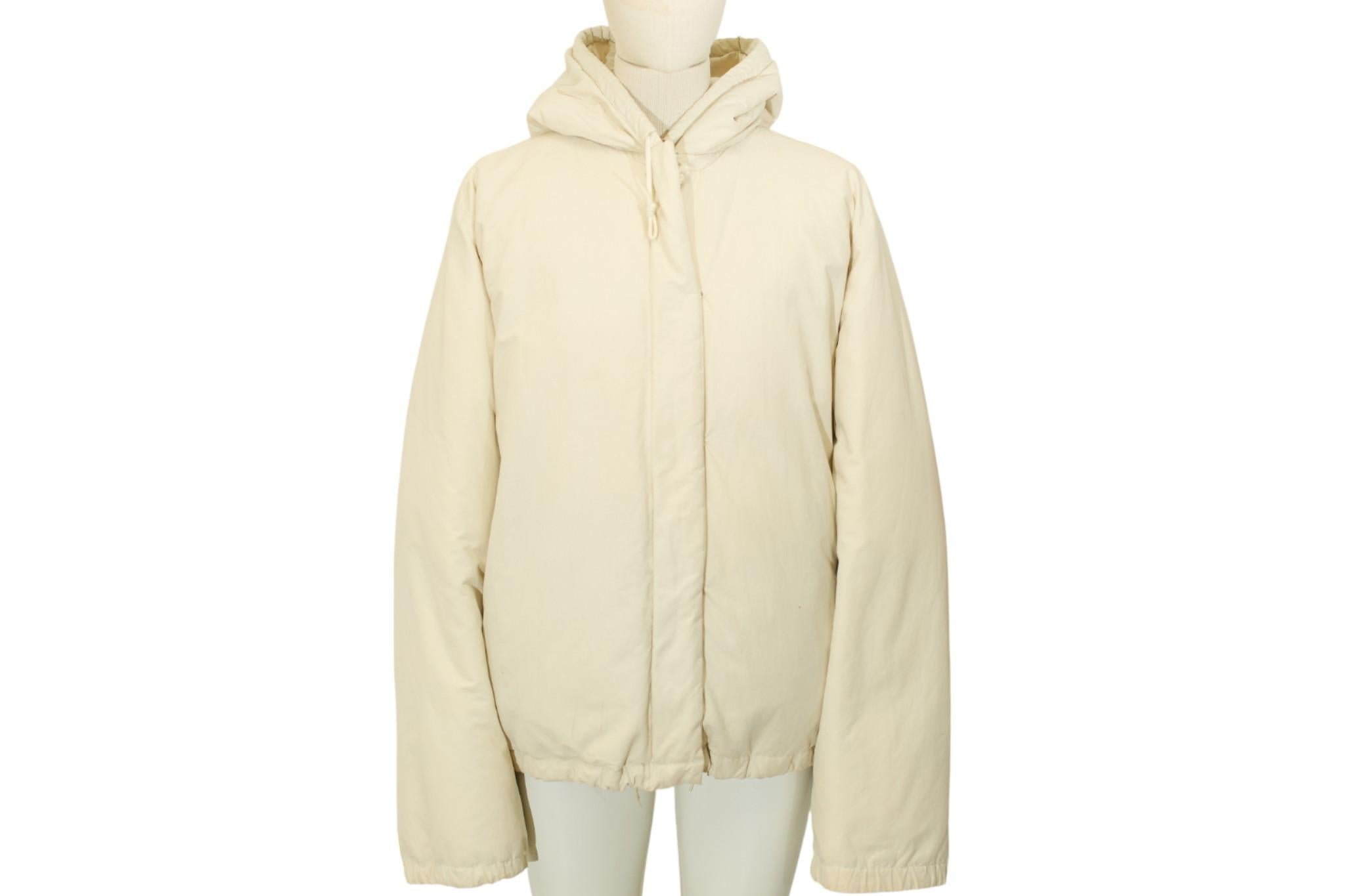 Classic down jacket Helmut Lang Bondage Puffer jacket with bold strap details. There are slight marks on the inside of the jacket.