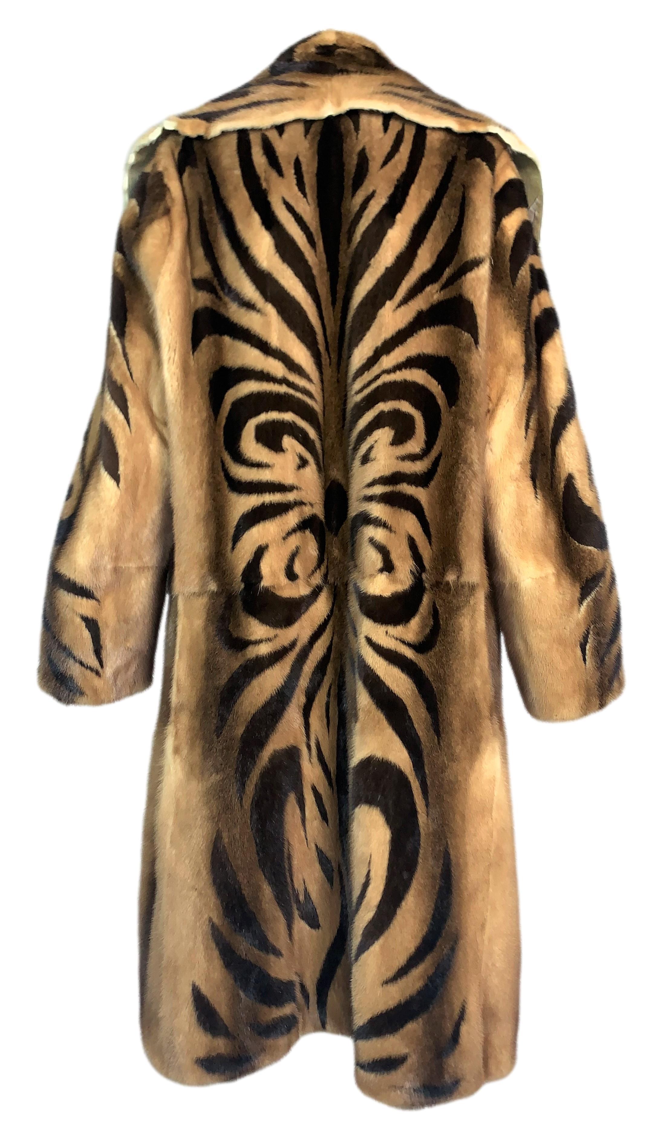 DESIGNER: F/W 1999 Roberto Cavalli

Please contact us for more images and/or information.

CONDITION: Good- has raw edges on the collar and open front

FABRIC: Mink lined in cotton

COUNTRY: Italy

SIZE: No size tag

MEASUREMENTS; provided as a