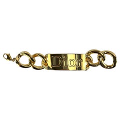Christian Dior par John Galliano, bracelet à chaîne en or avec logo et étiquette de défilé, A/H 2000
