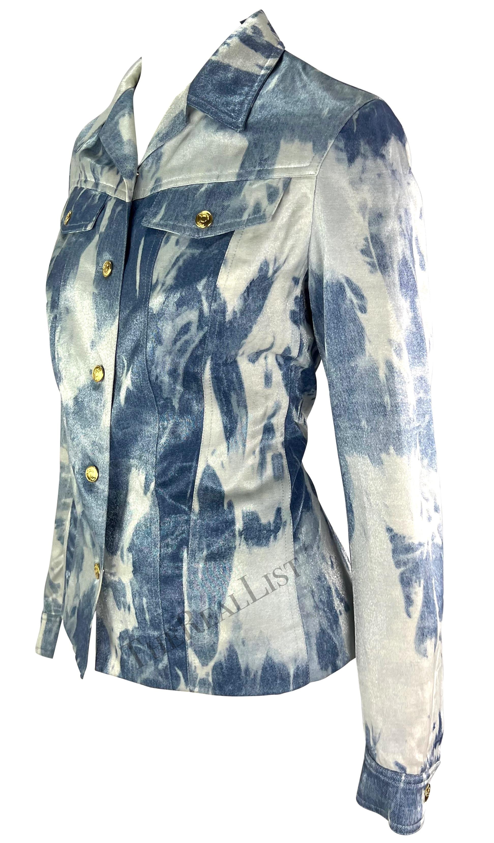 Featuring a blue tie-dye trucker-style jacket by Christian Dior, designed by John Galliano from the popular Spring/Summer 2000 collection. This jacket showcases the collection's well-known blue bleached denim-style tie-dye pattern, offering a subtle