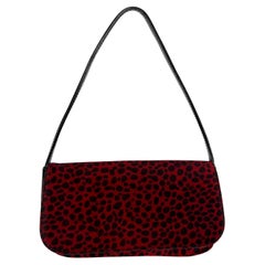 F/W 2000 Dolce & Gabbana Bolso con solapa de pelo de poni rojo y estampado de guepardo