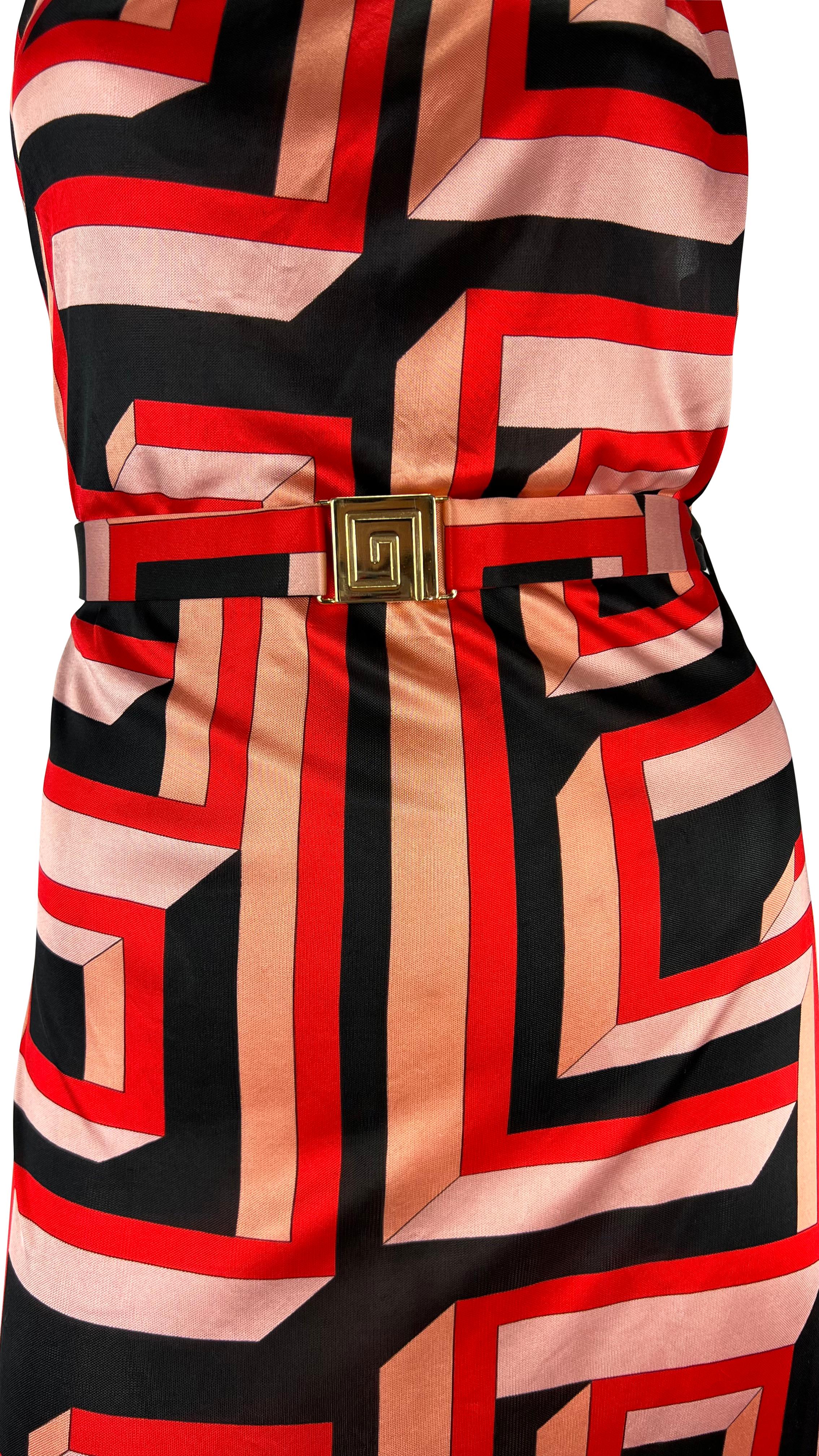 Presenting a chic red and black Greek key Gianni Versace mini dress, designed by Donatella Versace. From the Fall/Winter 2000 collection, this single-shoulder asymmetric dress is covered in a large red Greek key pattern. The single shoulder strap