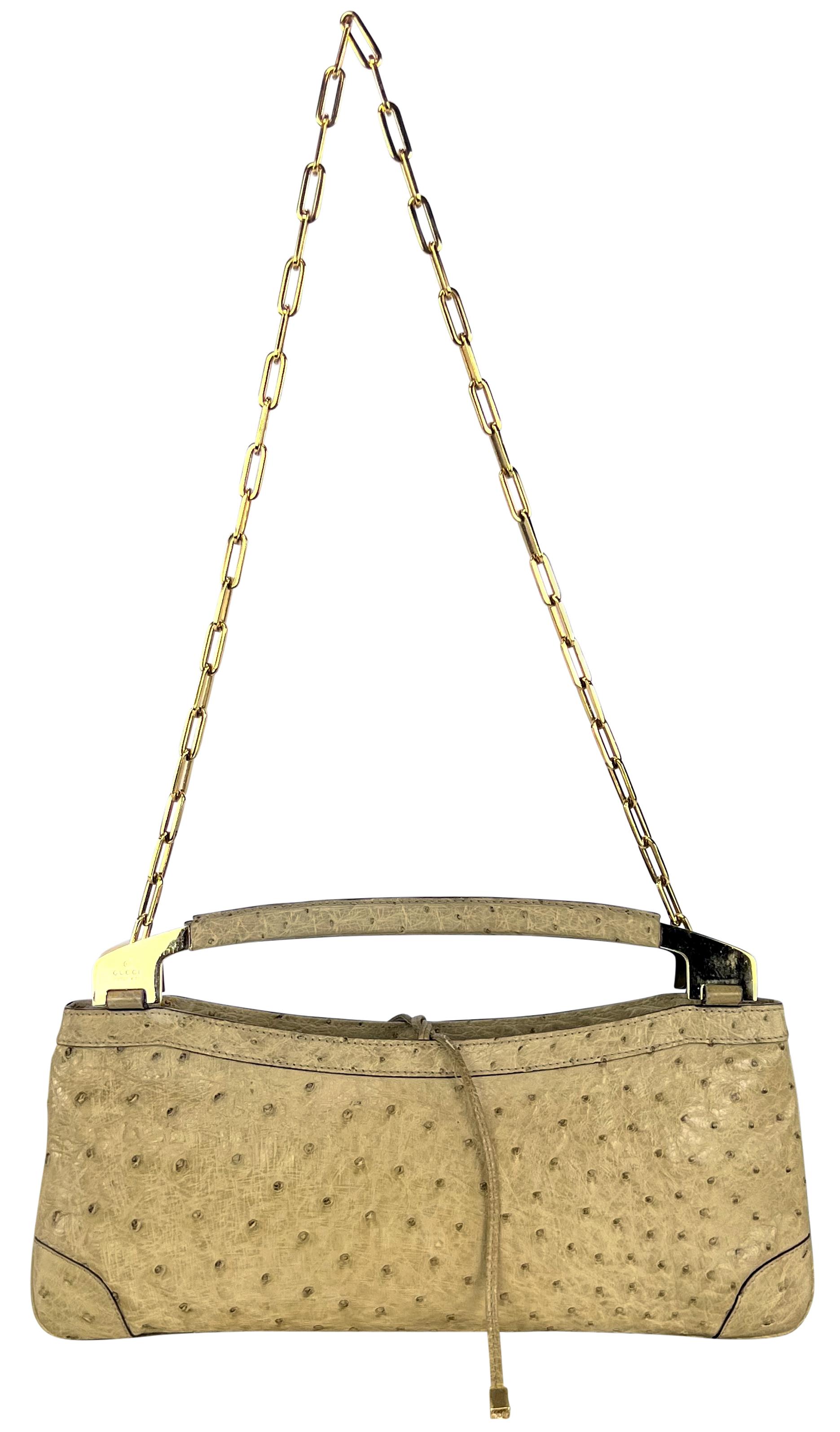 Tom Ford designed this chic light tan ostrich leather top handle bag for Gucci's Fall/Winter 2000 collection. A black leather version of this bag debuted on the season's runway as part of look 12. Crafted entirely from genuine ostrich skin, this bag