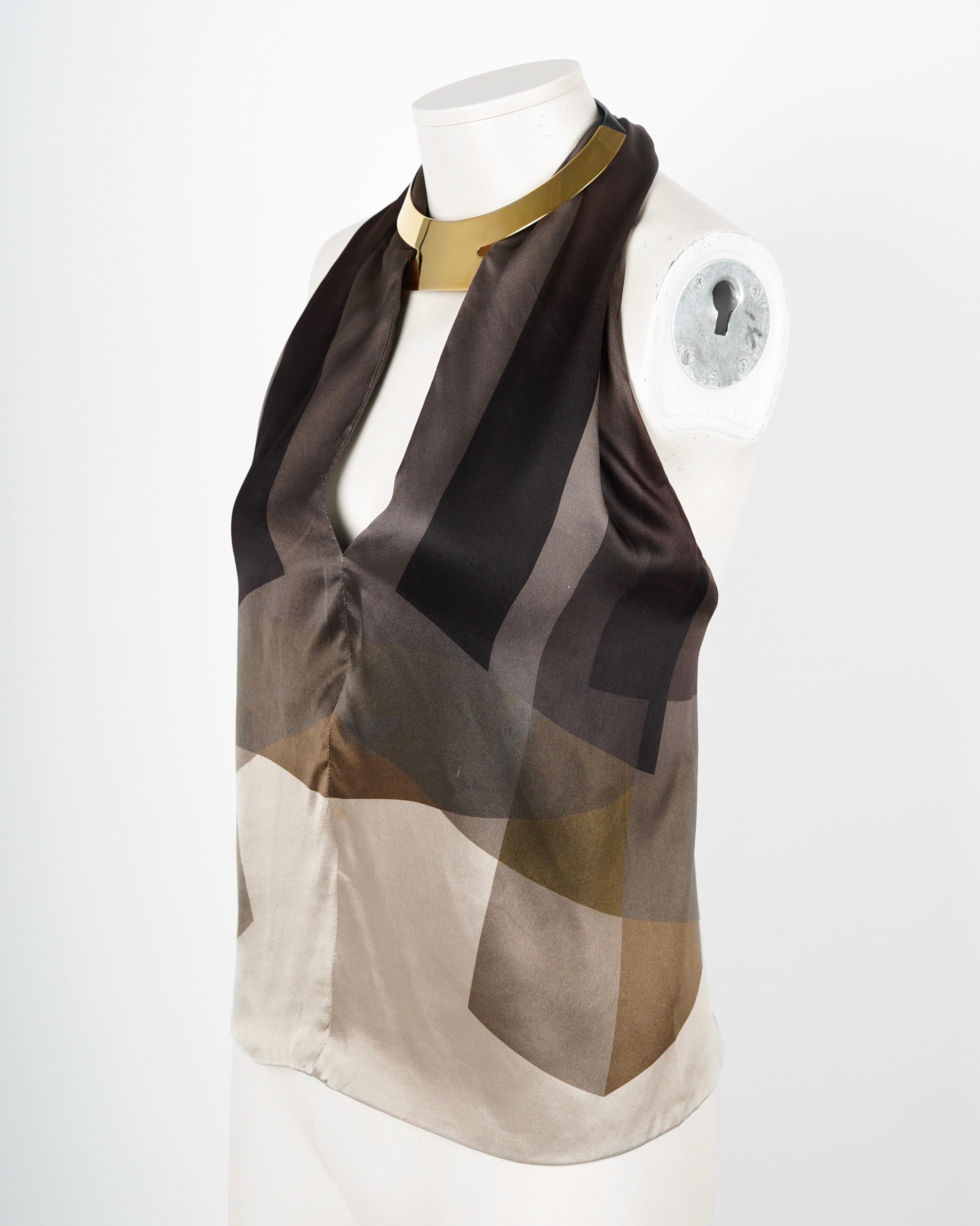 Presenting a F/W 2000 Gucci by Tom Ford 70s-inspired Printed Silk Neckholder Top

- gold toned metallic neck piece that is closed in the back with a studded leather strap
- silken, flowing fit
- chest cut out
- gold toned hardware
- 70s inspired