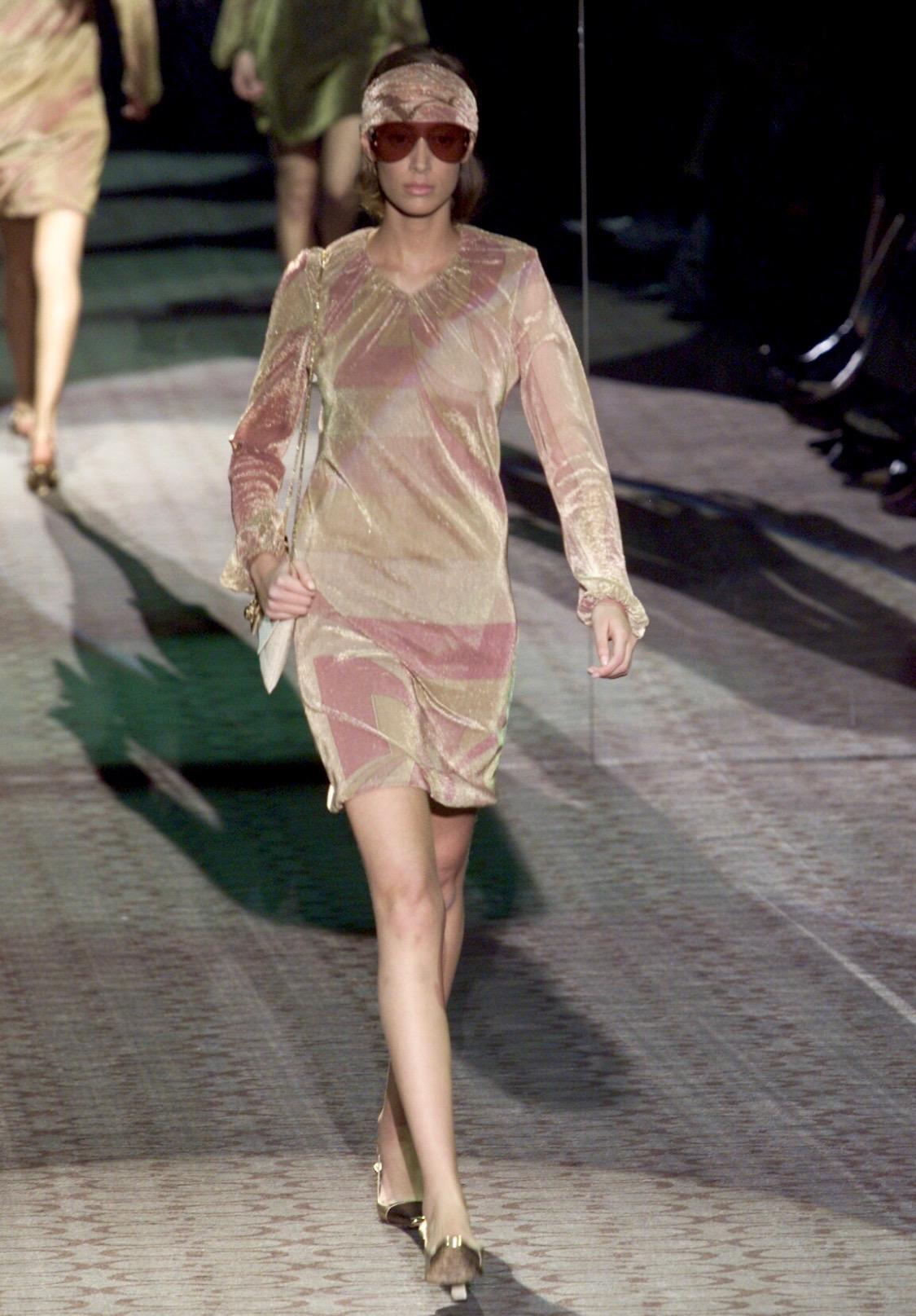 Presenting a glittery disco-chic geometric gold lurex shift dress designed by Tom Ford for Gucci's Fall/Winter 2000 collection. Debuting as Look 30 on Talytha Pugliesi, this piece is perfect for day or night! The sheer metallic fabric is layered at