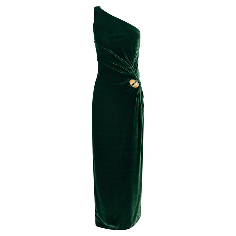 kim kardashian green gucci velvet dress Kim Kardashian West Wore a Six-Pack Schiaparelli Leather Outfit for Christmas 2020
