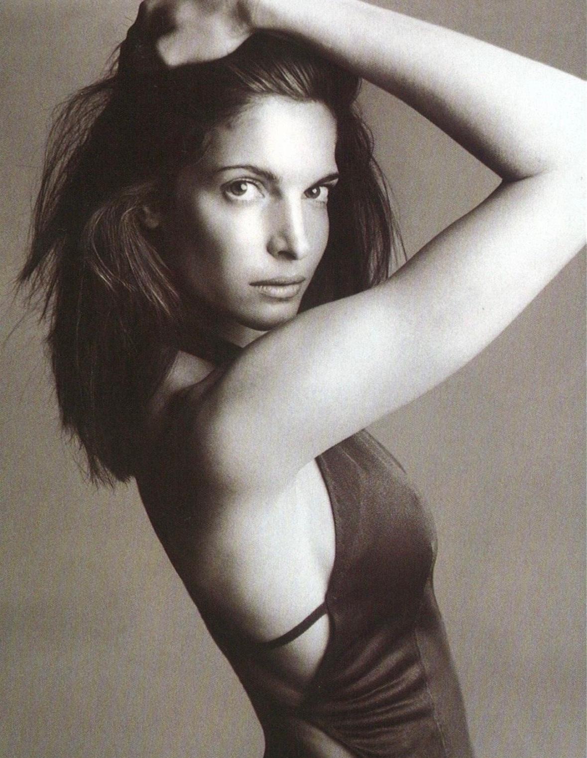 From Alaïa's Fall/Winter 2001 collection, this sexy, form-fitting halterneck dress wraps around the neck to create a V-neckline. The same style worn by Stephanie Seymour and Naomi Campbell in shoots with the namesake designer, this stretchy dress