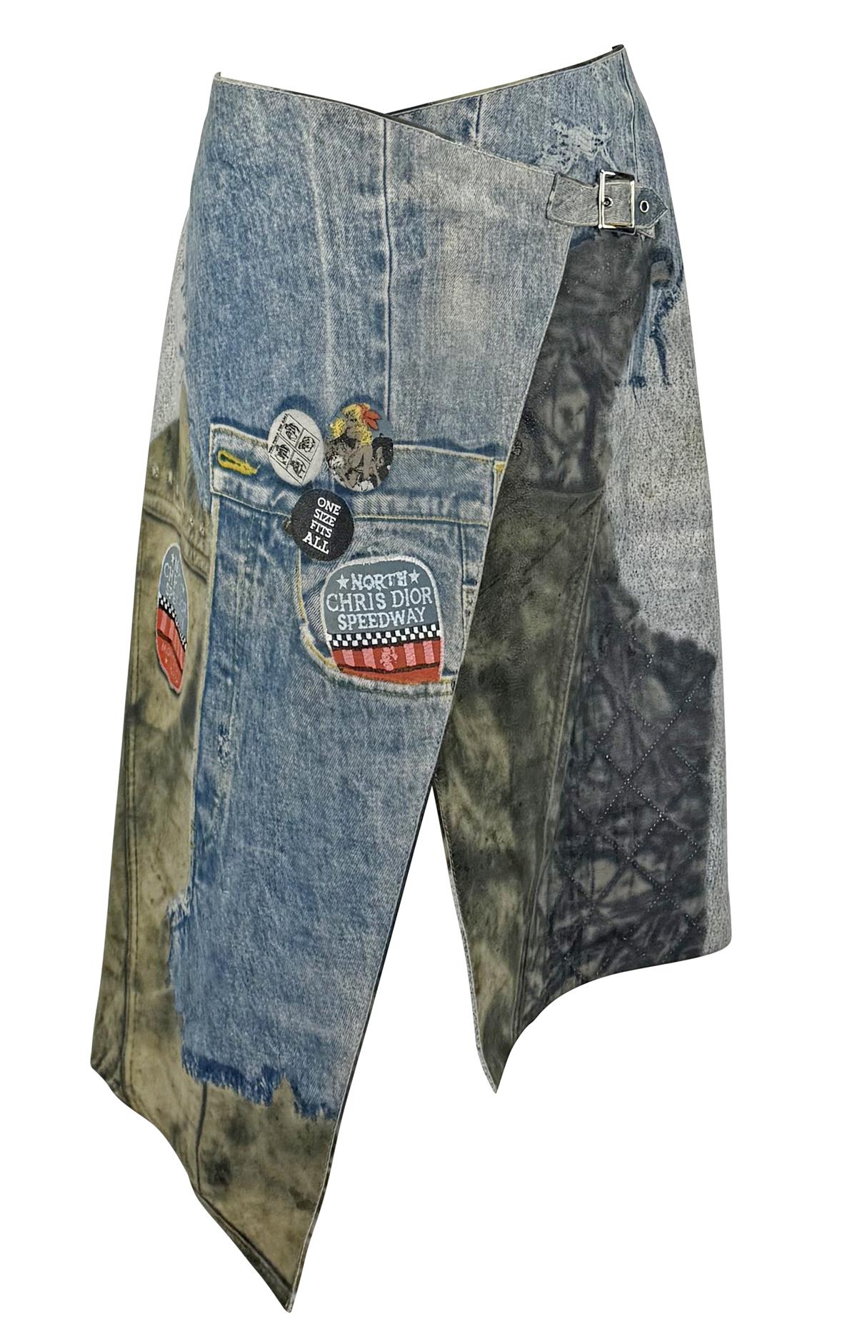 From Christian Dior’s Fall/Winter 2001 collection by John Galliano, this soft leather wrap skirt features a trompe l’oeil denim print, creating the illusion of layered jeans and distressed fabric. The asymmetric silhouette is accented with printed