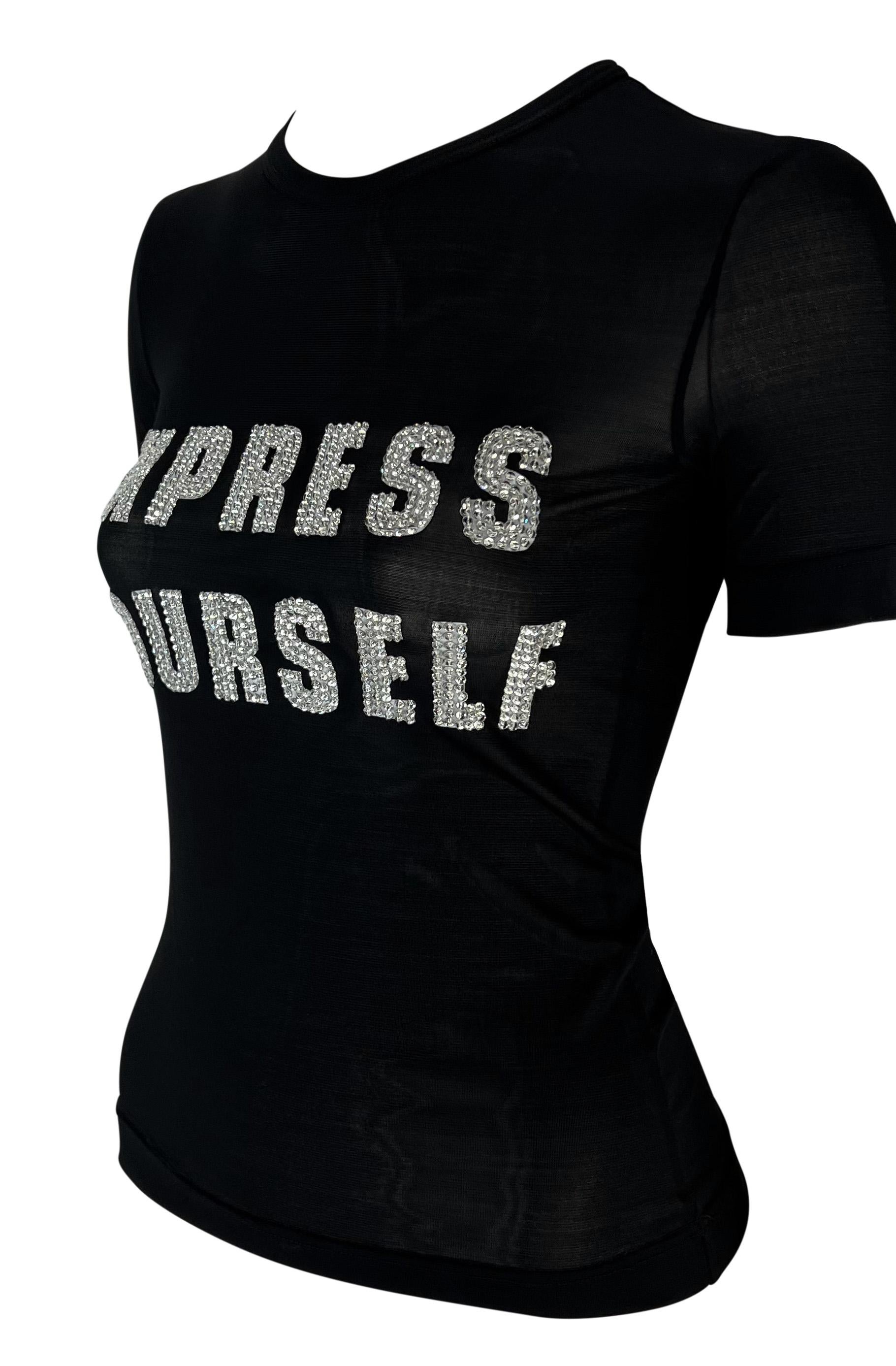 From Fall/Winter 2001 collection, this sheer black Dolce & Gabbana shirt is a must-have for any 'material girl'. This sexy top features short sleeves and a crew neckline. The top is complete with 'Express Yourself' accented with rhinestones at the
