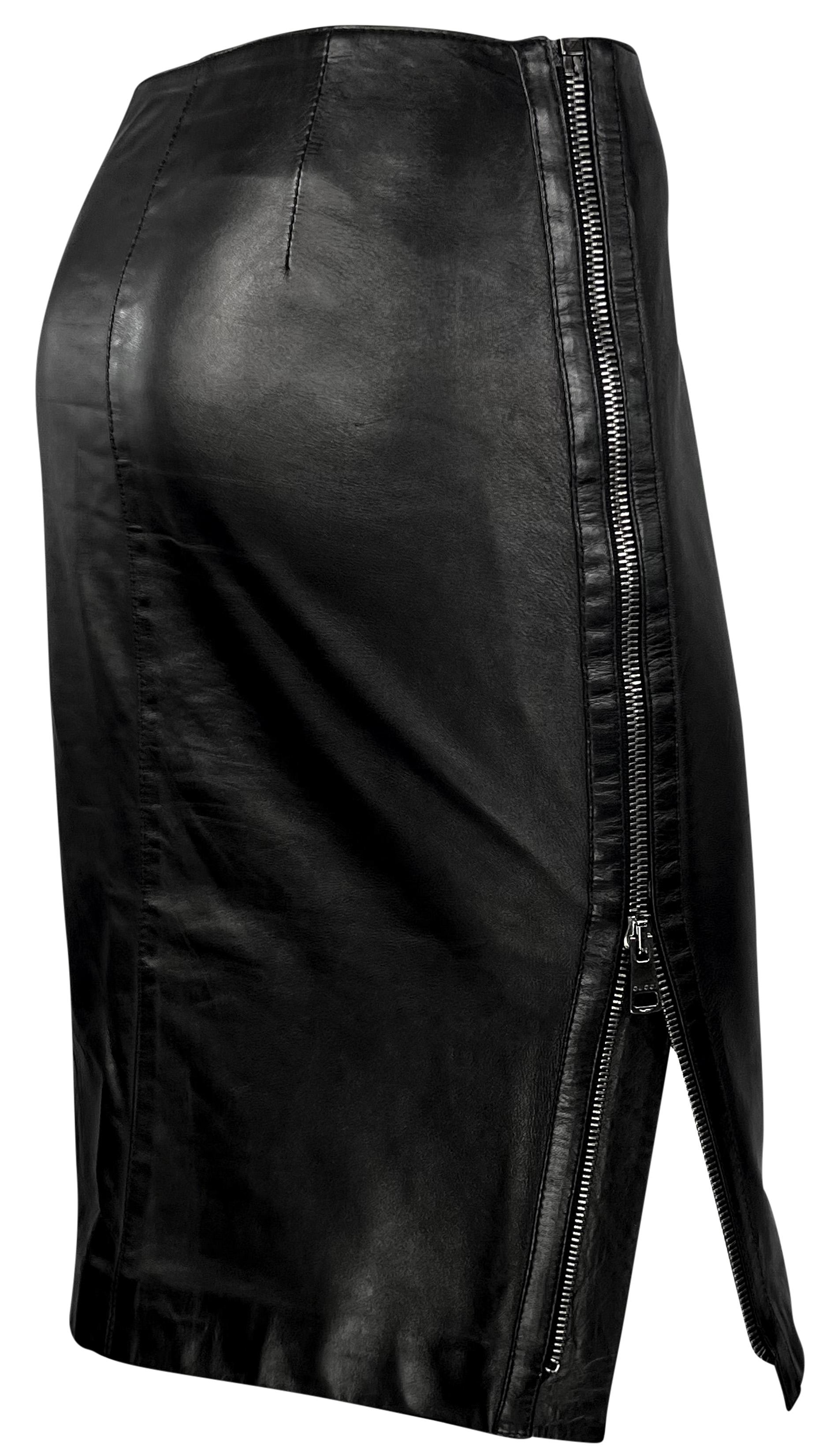 From the Fall/Winter 2001 collection, this black Gucci by Tom Ford skirt is constructed entirely of leather. Accented with a large zipper on one side, a design Ford later brought to his own label; this leather Gucci skirt is an elevated closet